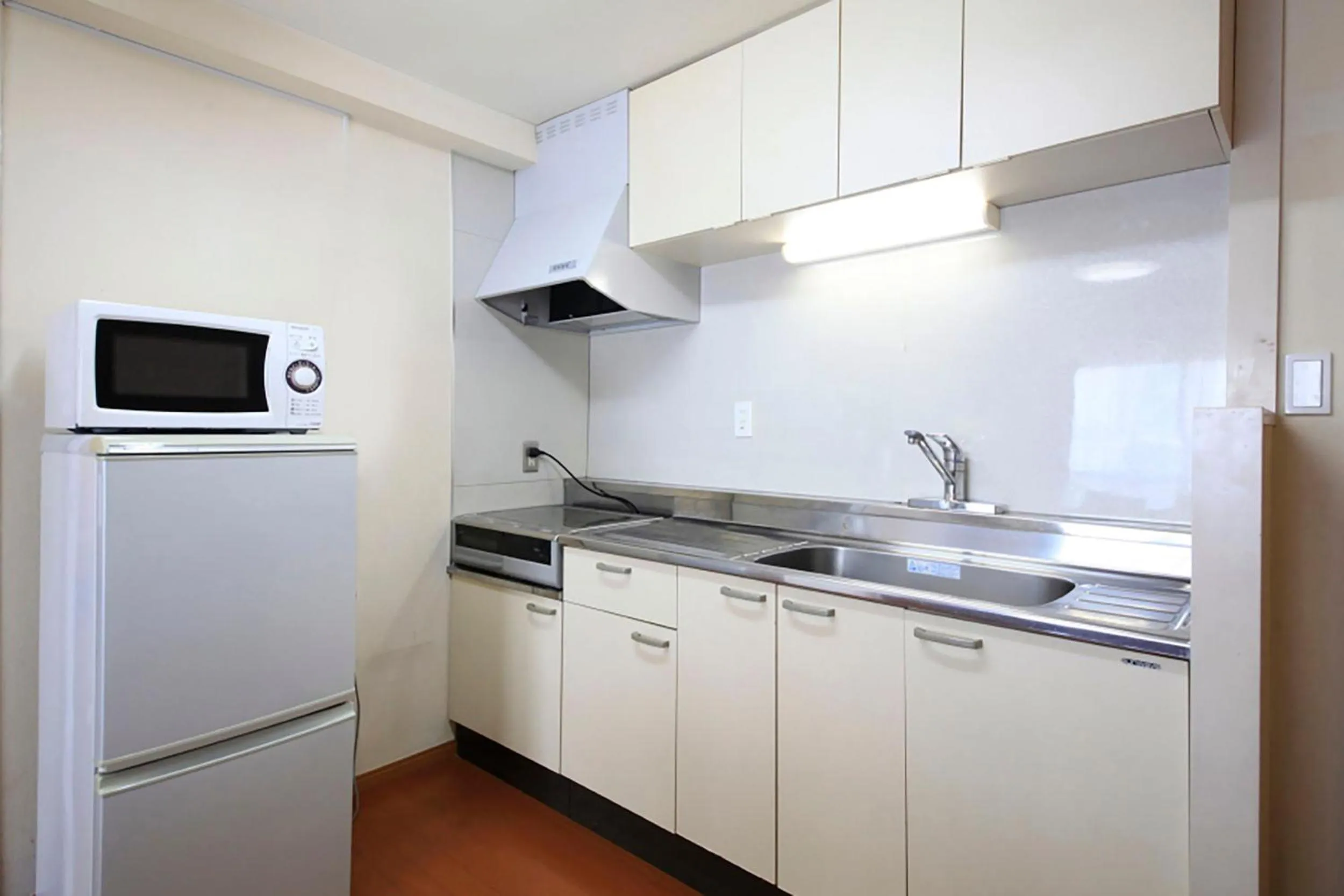 Kitchen or kitchenette in Shinjuku Urban Hotel