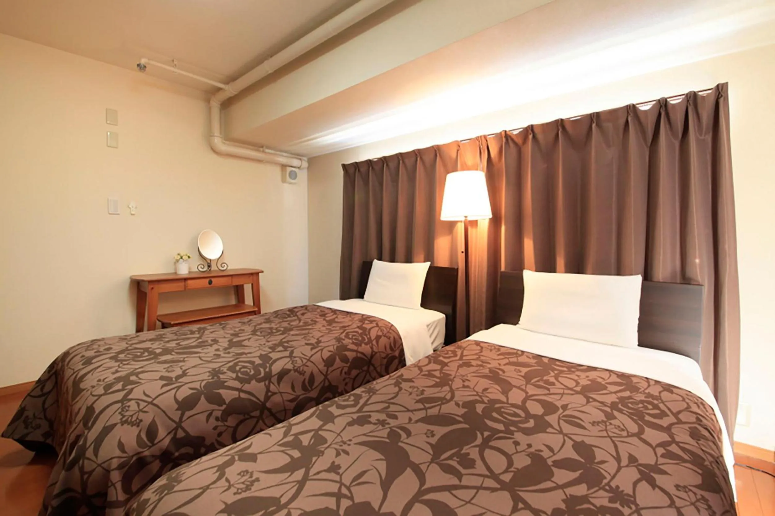 Bed in Shinjuku Urban Hotel