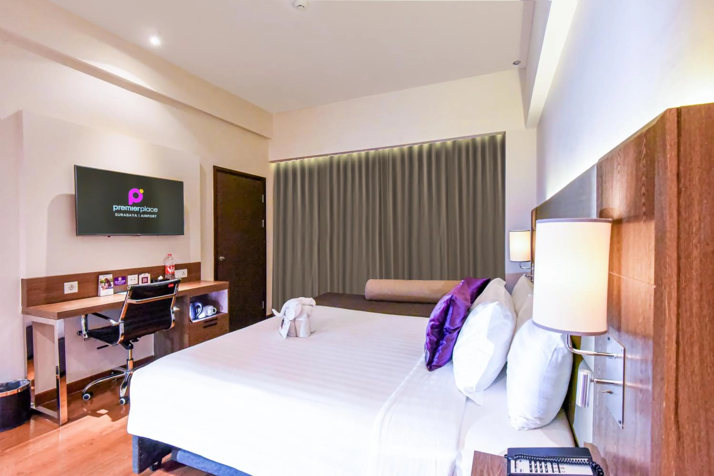 Photo of the whole room, Bed in Premier Place Surabaya Airport