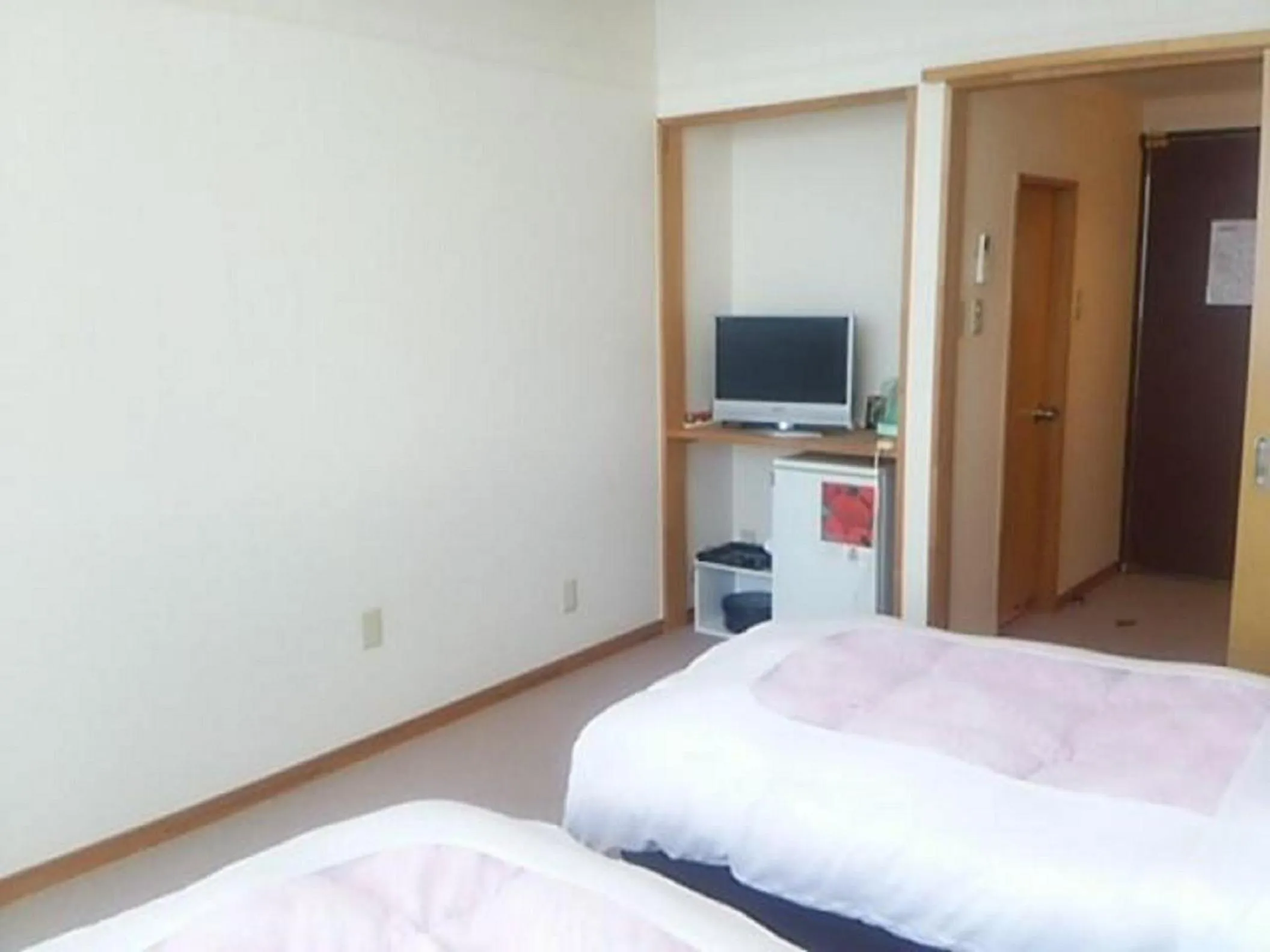 Photo of the whole room, Bed in Hotel Tetora Resort Tsuruoka