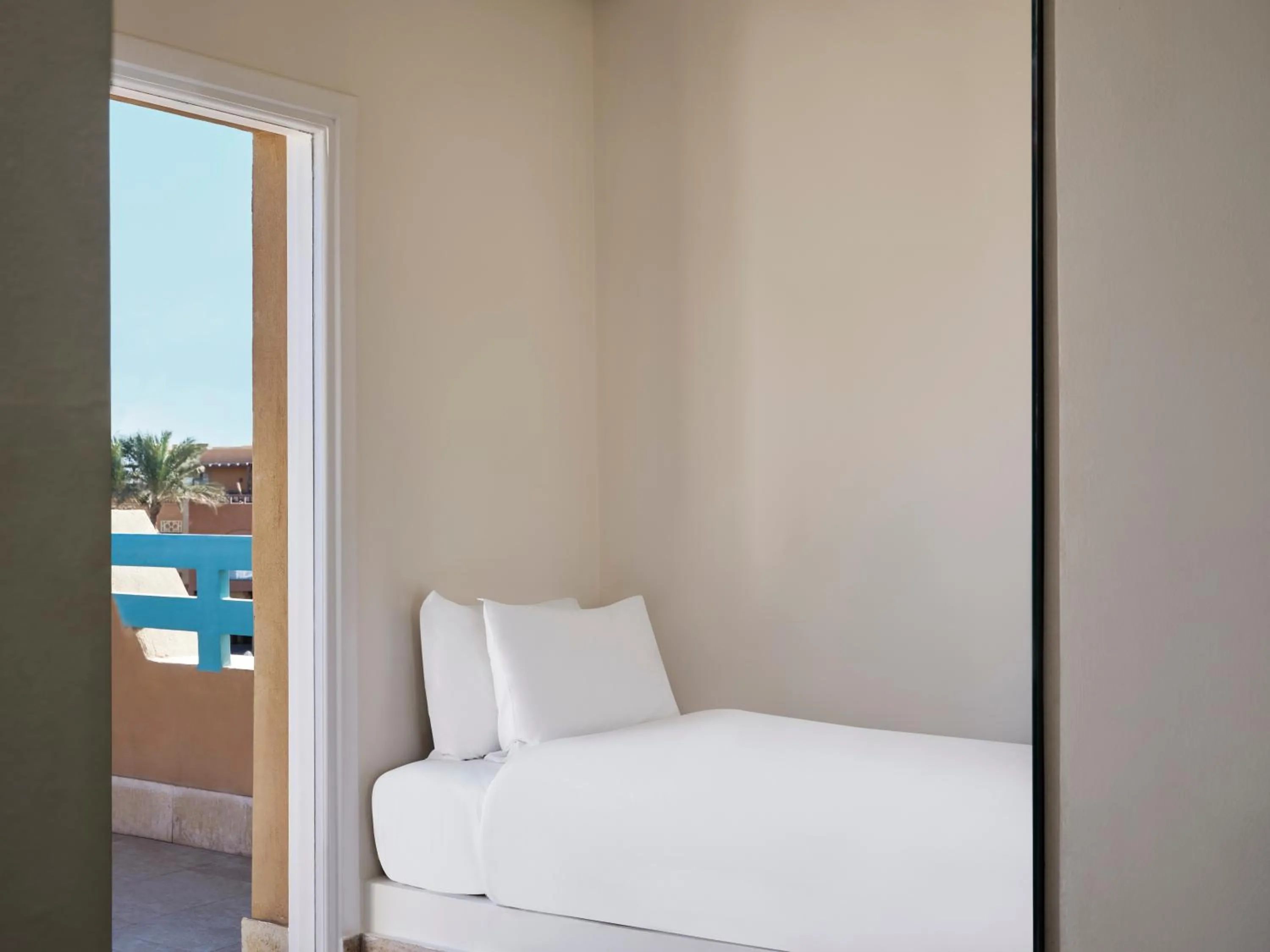 Bed in Captain's Inn Hotel