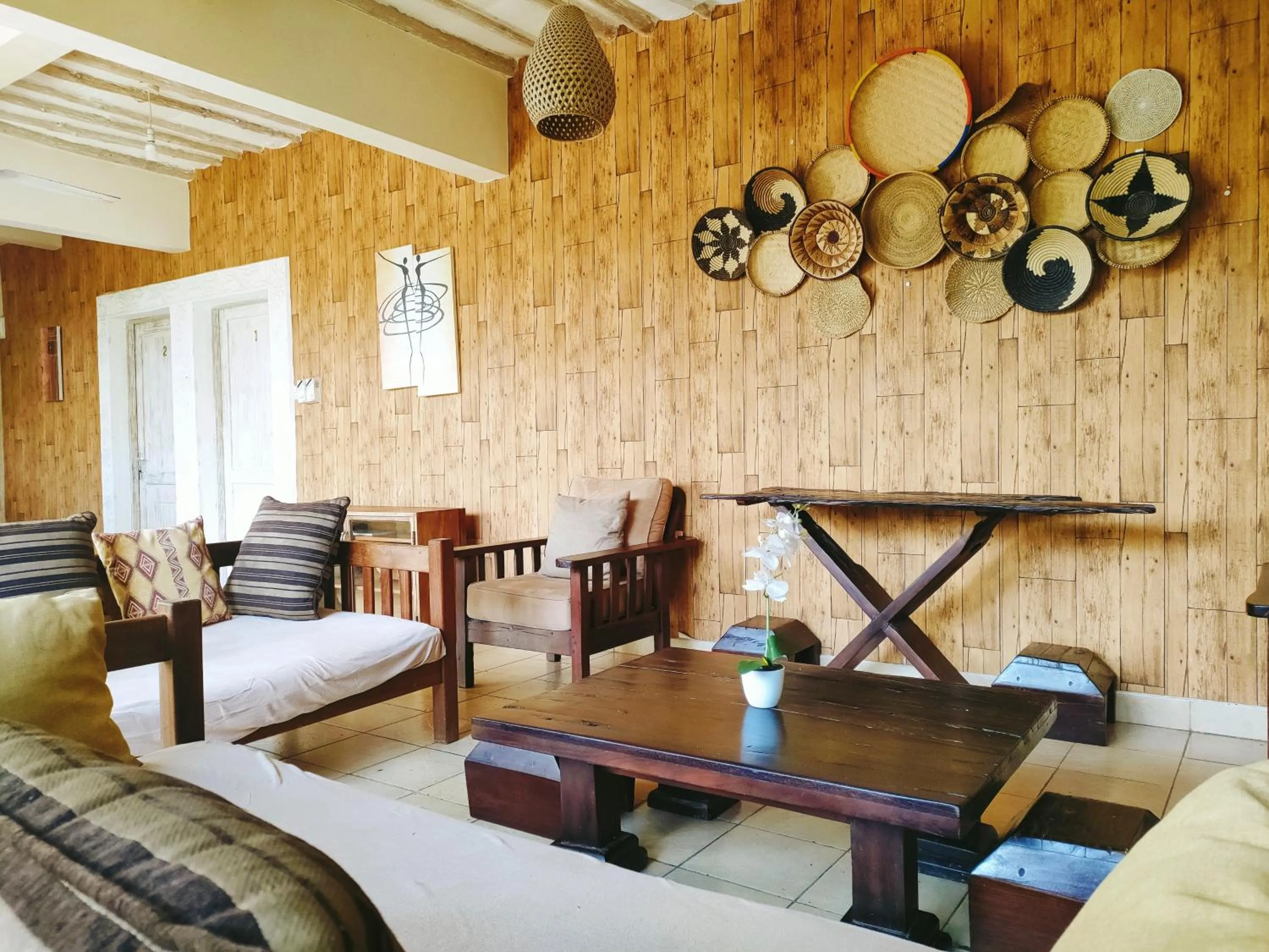 Communal lounge/ TV room in Upani in Diani