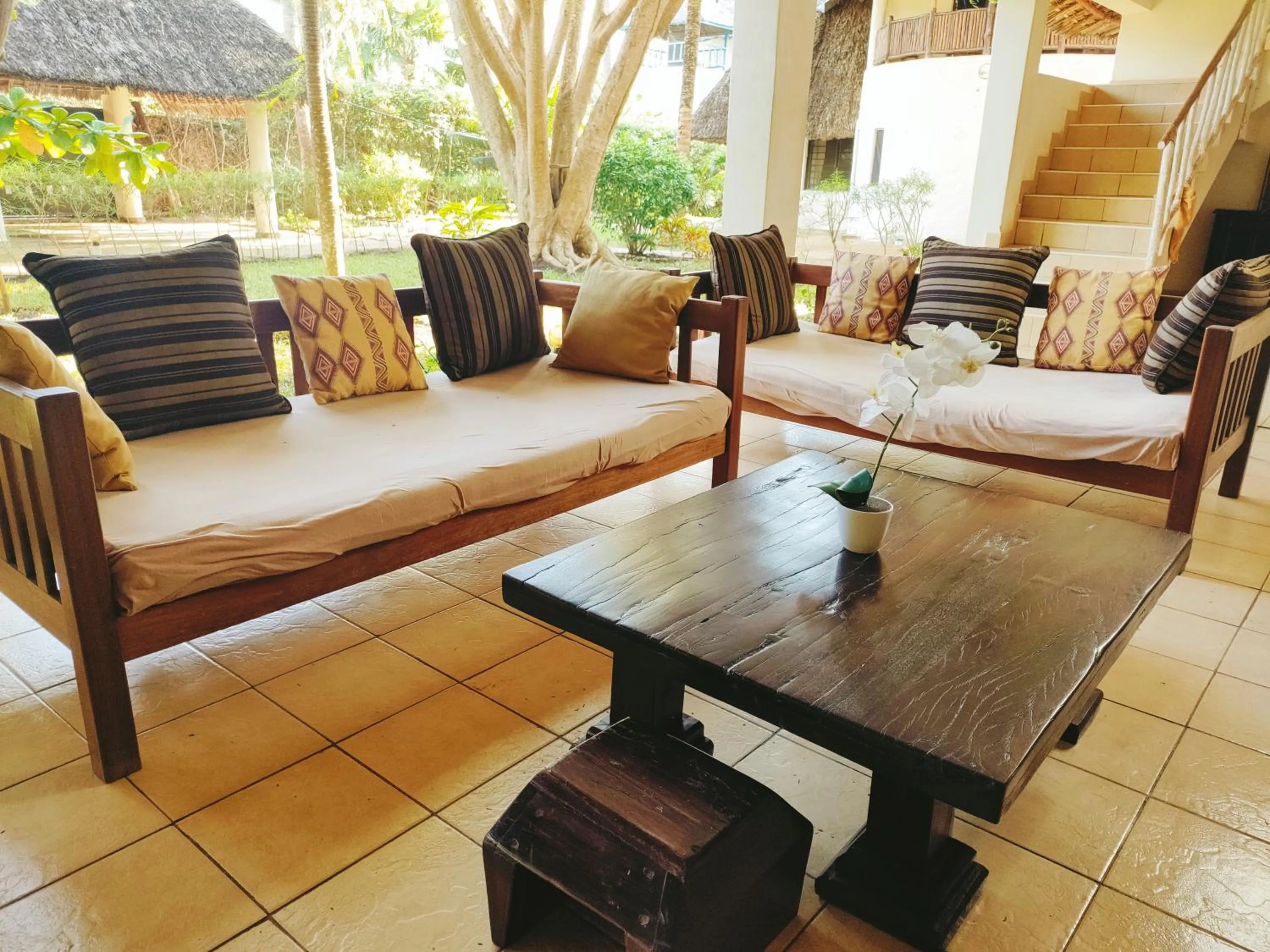 Communal lounge/ TV room in Upani in Diani