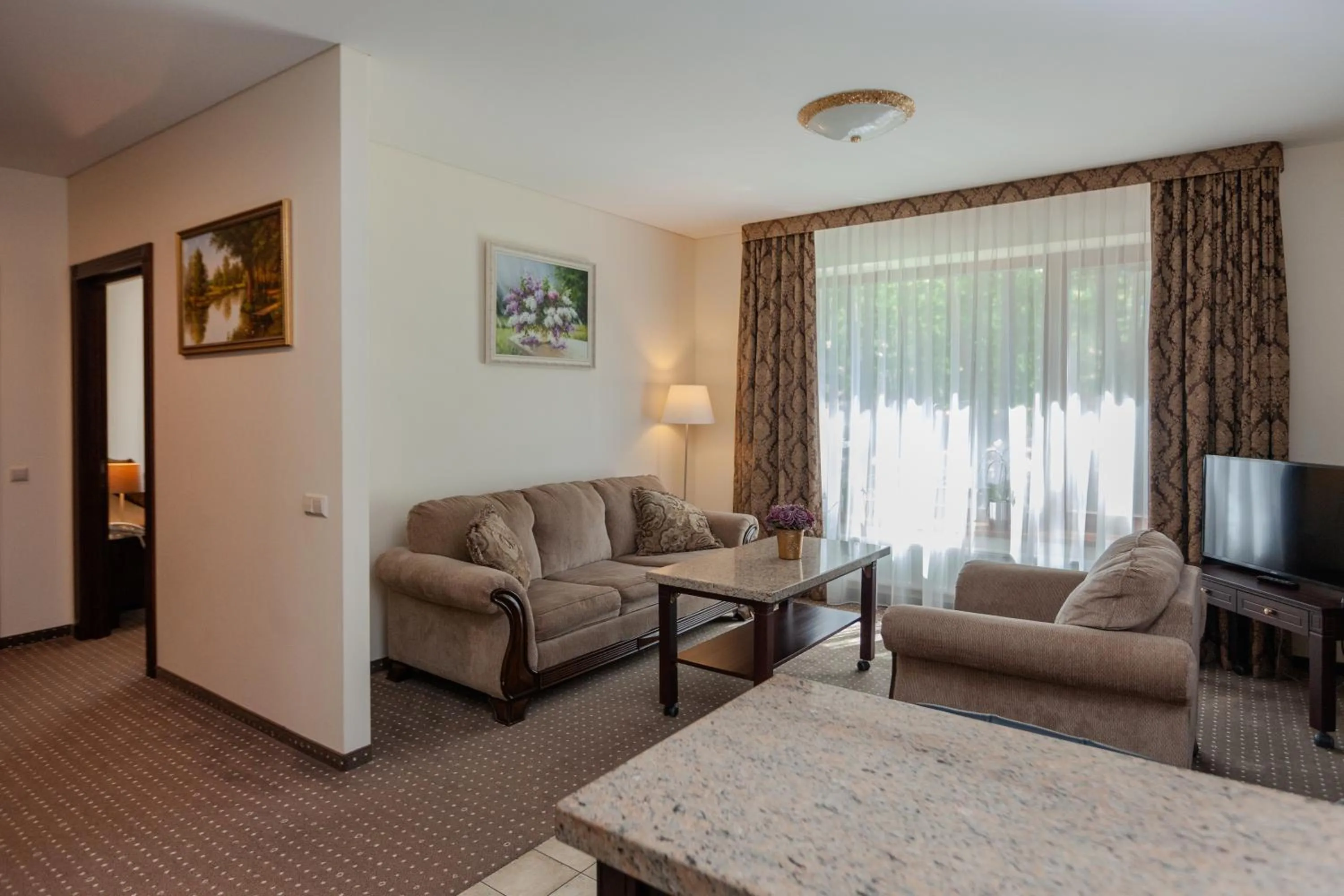 Communal lounge/ TV room in Pušynė