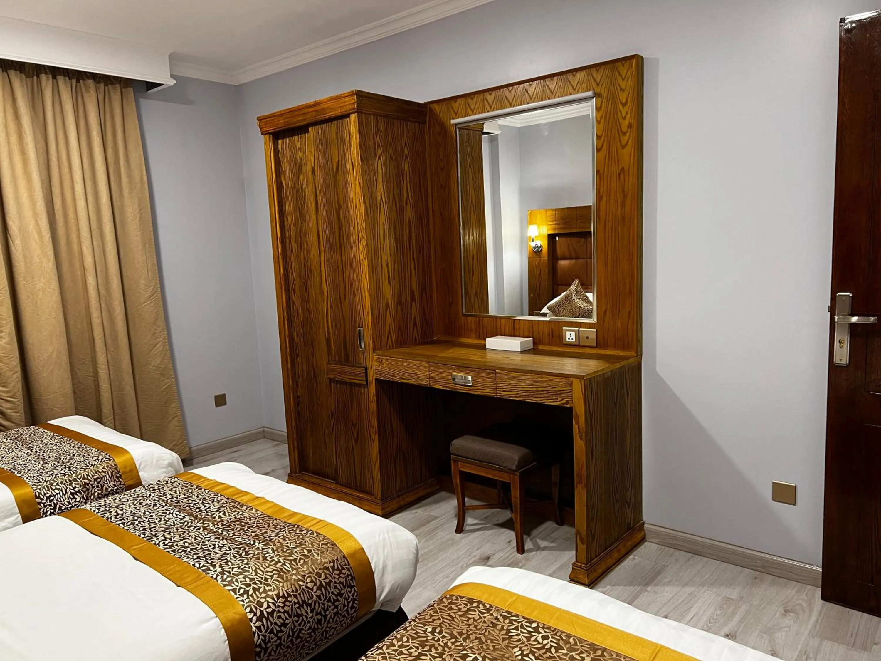 Bedroom, Bed in Travellerinn Serviced Apartment