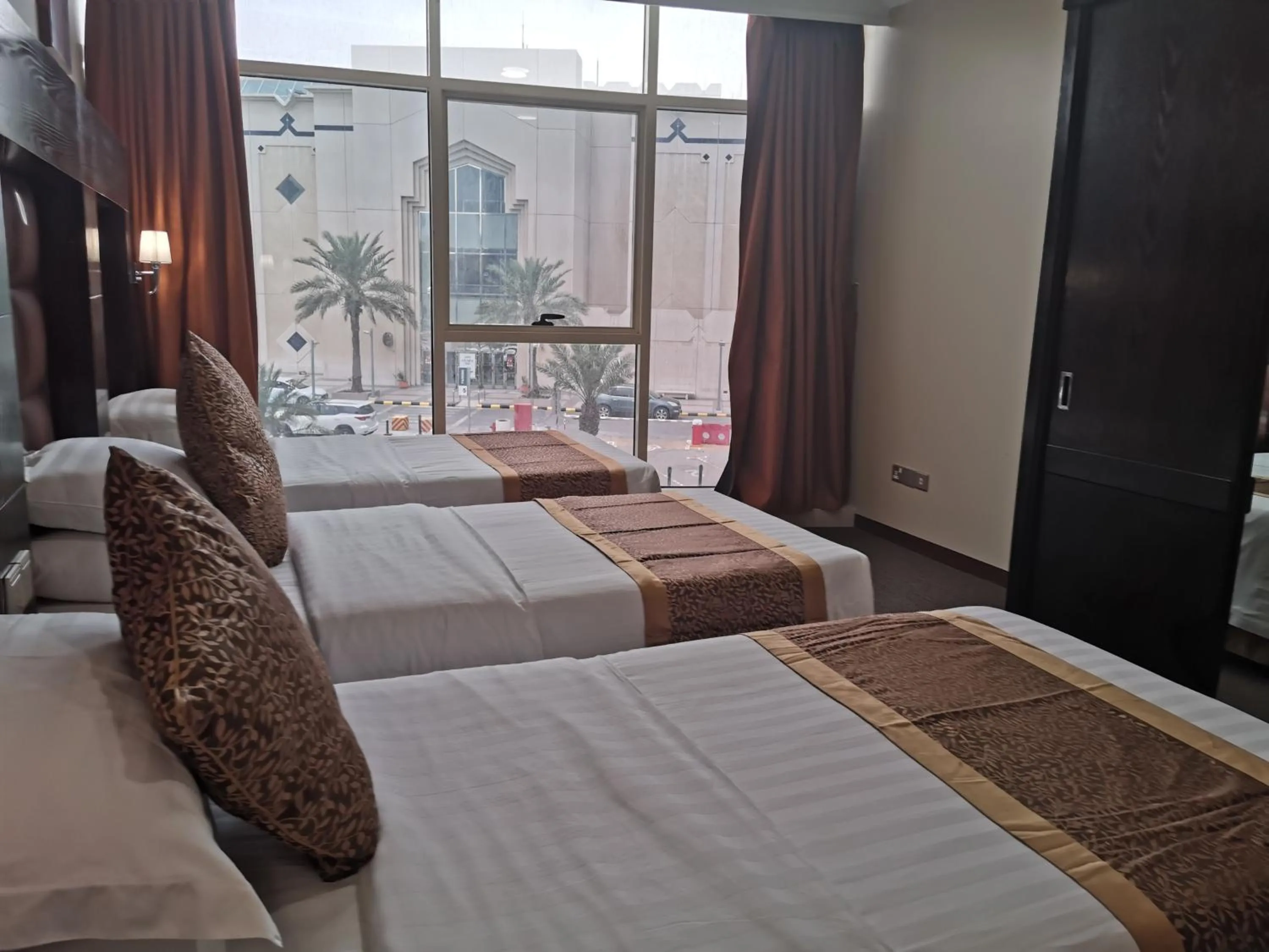 Bedroom, Bed in Travellerinn Serviced Apartment