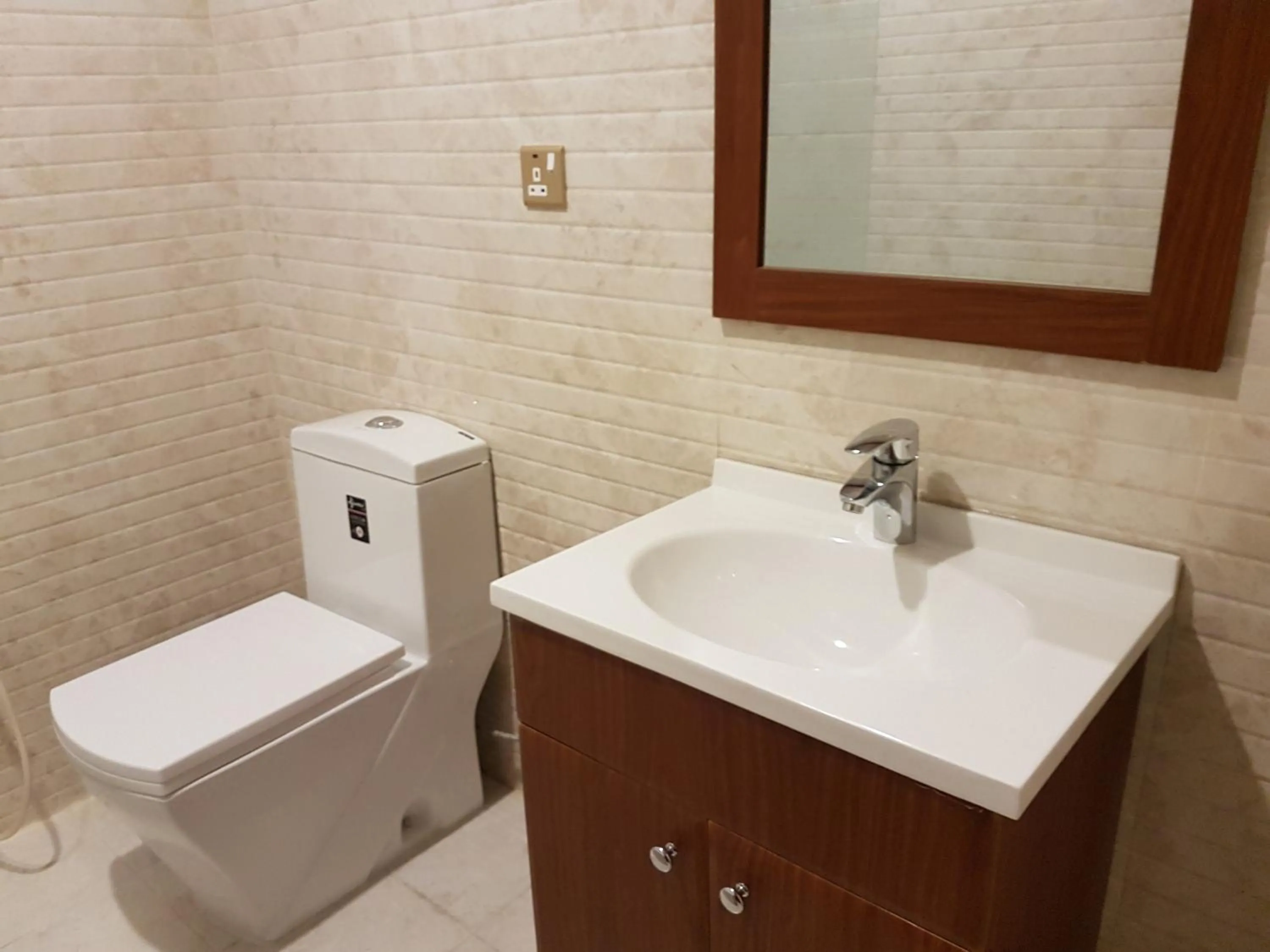 Bathroom in Travellerinn Serviced Apartment