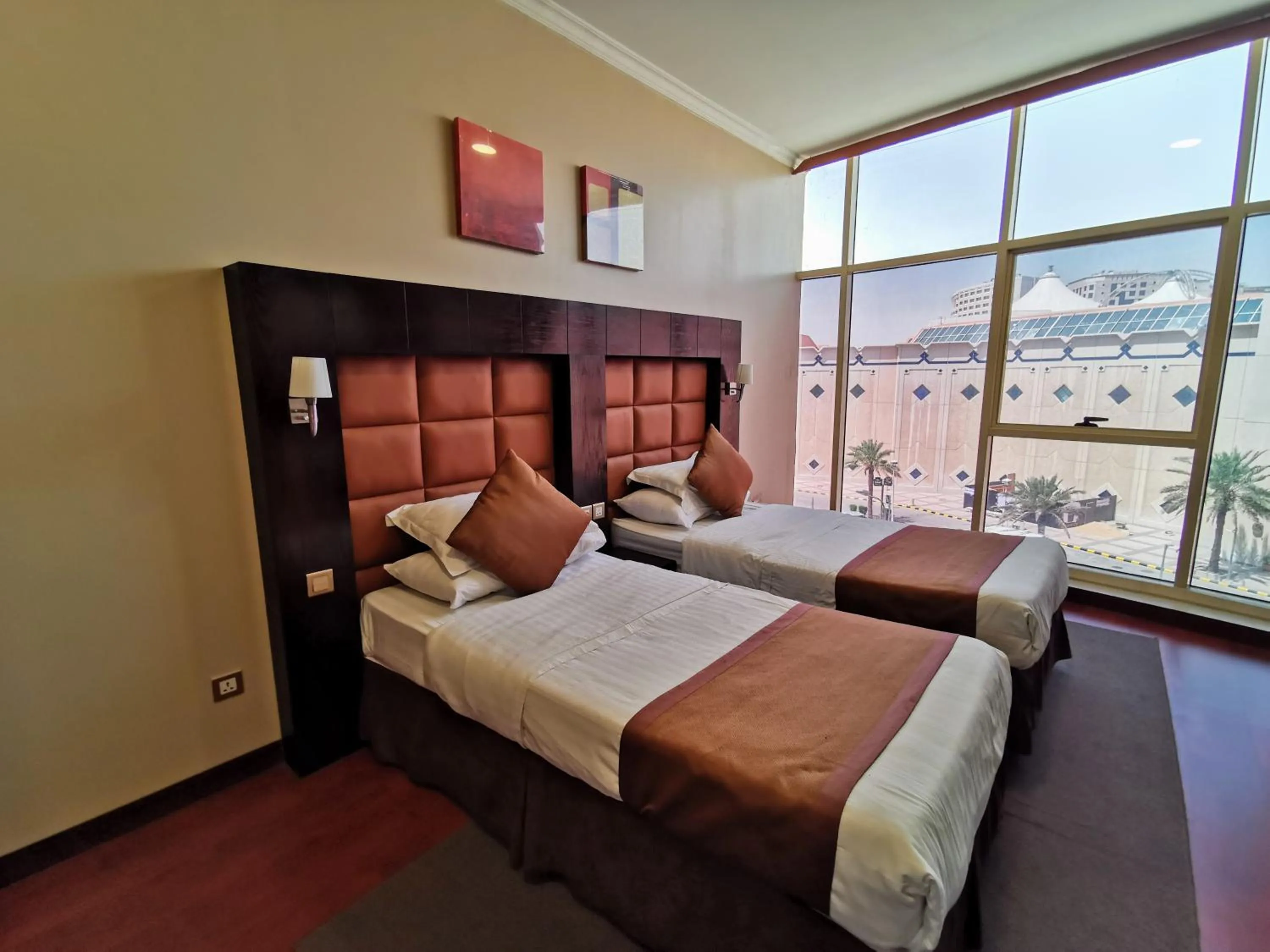 Bed in Travellerinn Serviced Apartment