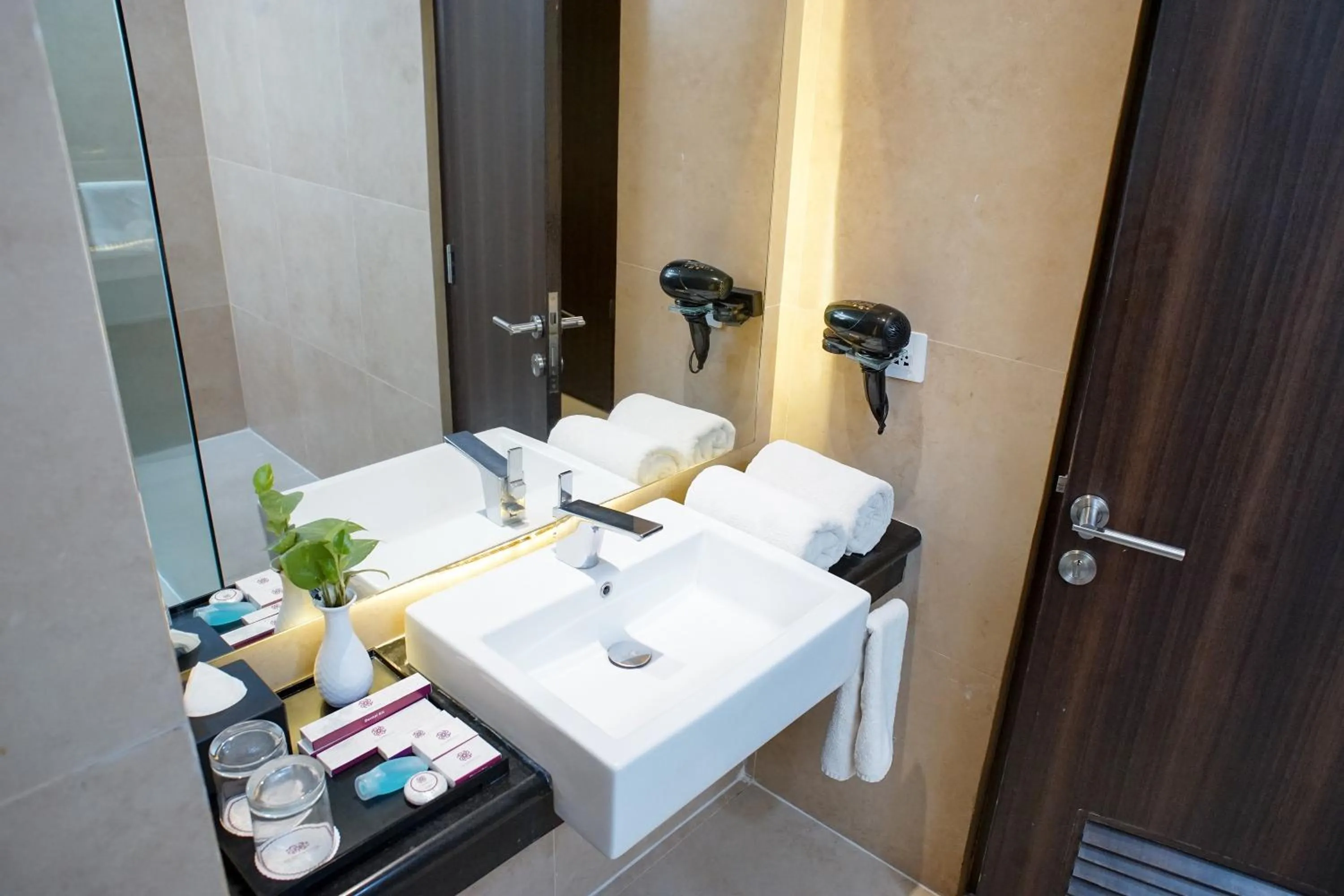 Bathroom in Adhiwangsa Hotel