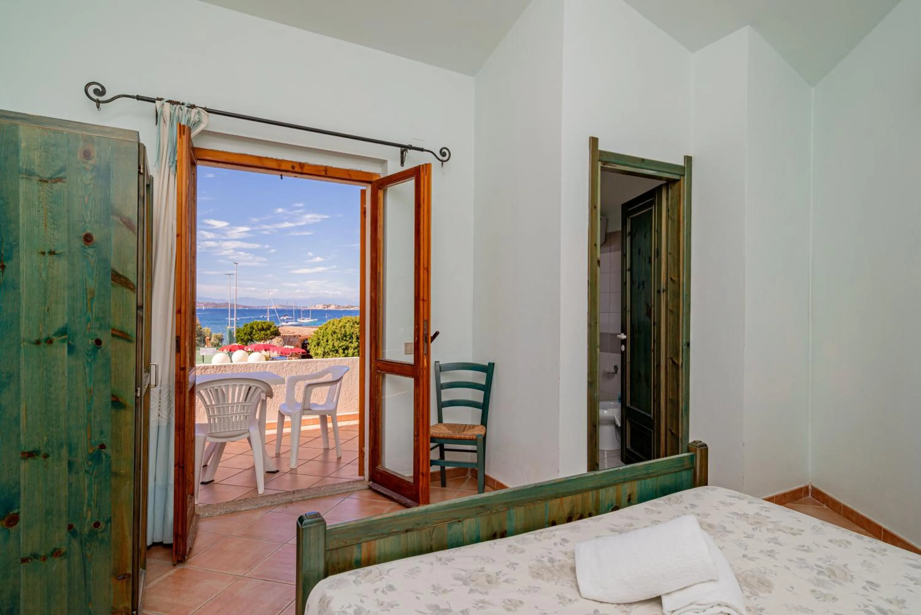 Bed in Club Esse Residence Capo D'orso