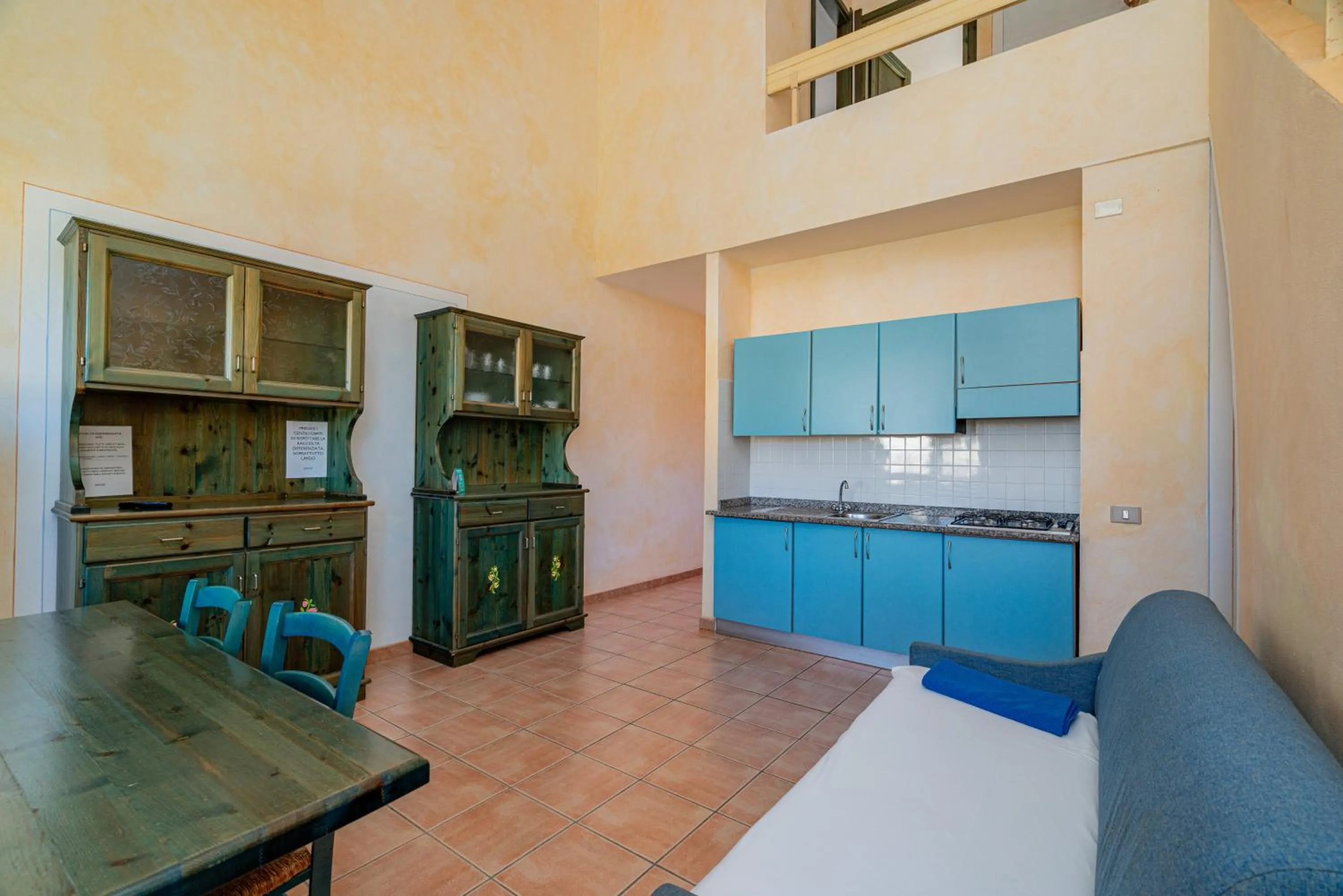 Living room in Club Esse Residence Capo D'orso