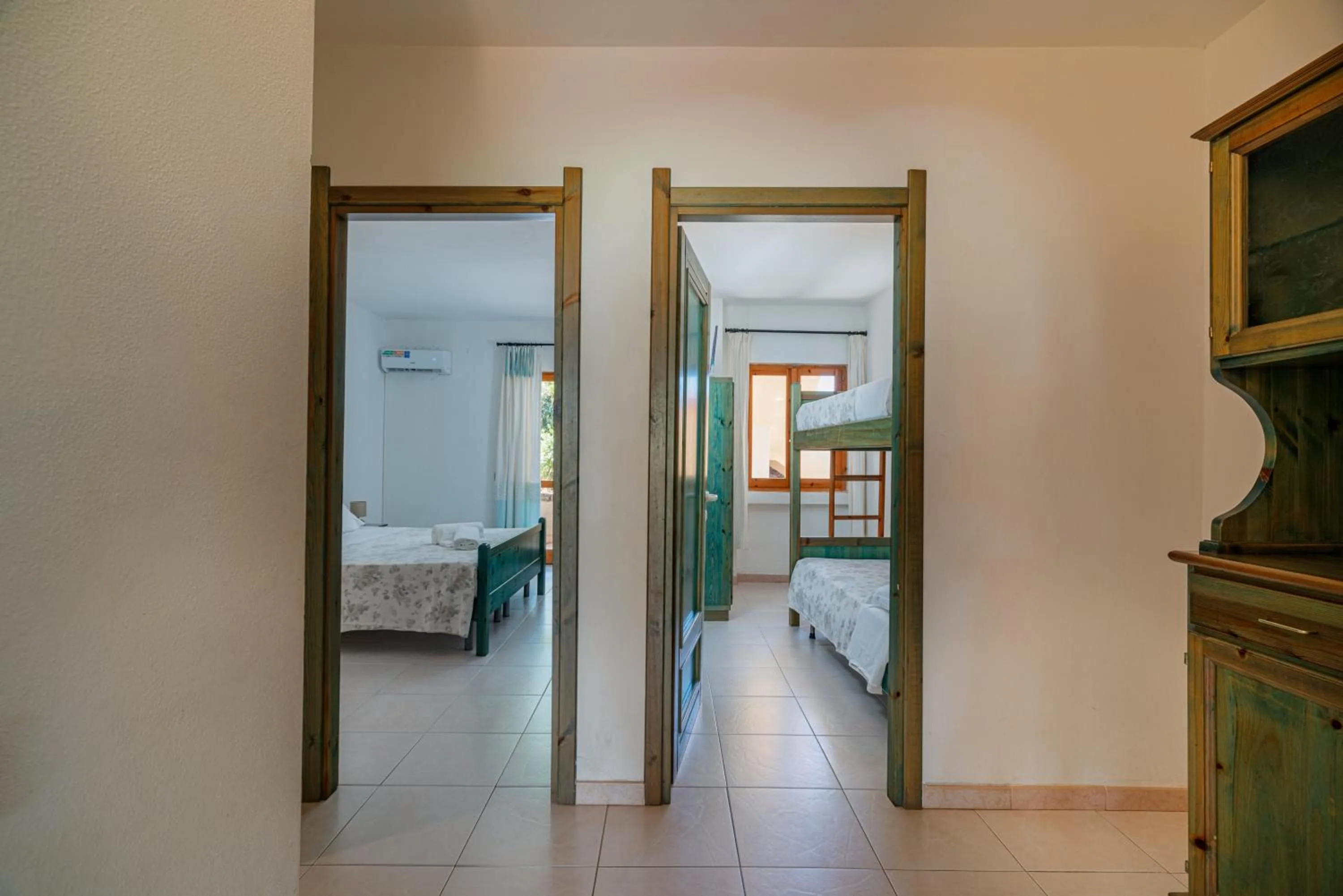 Photo of the whole room, Bed in Club Esse Residence Capo D'orso