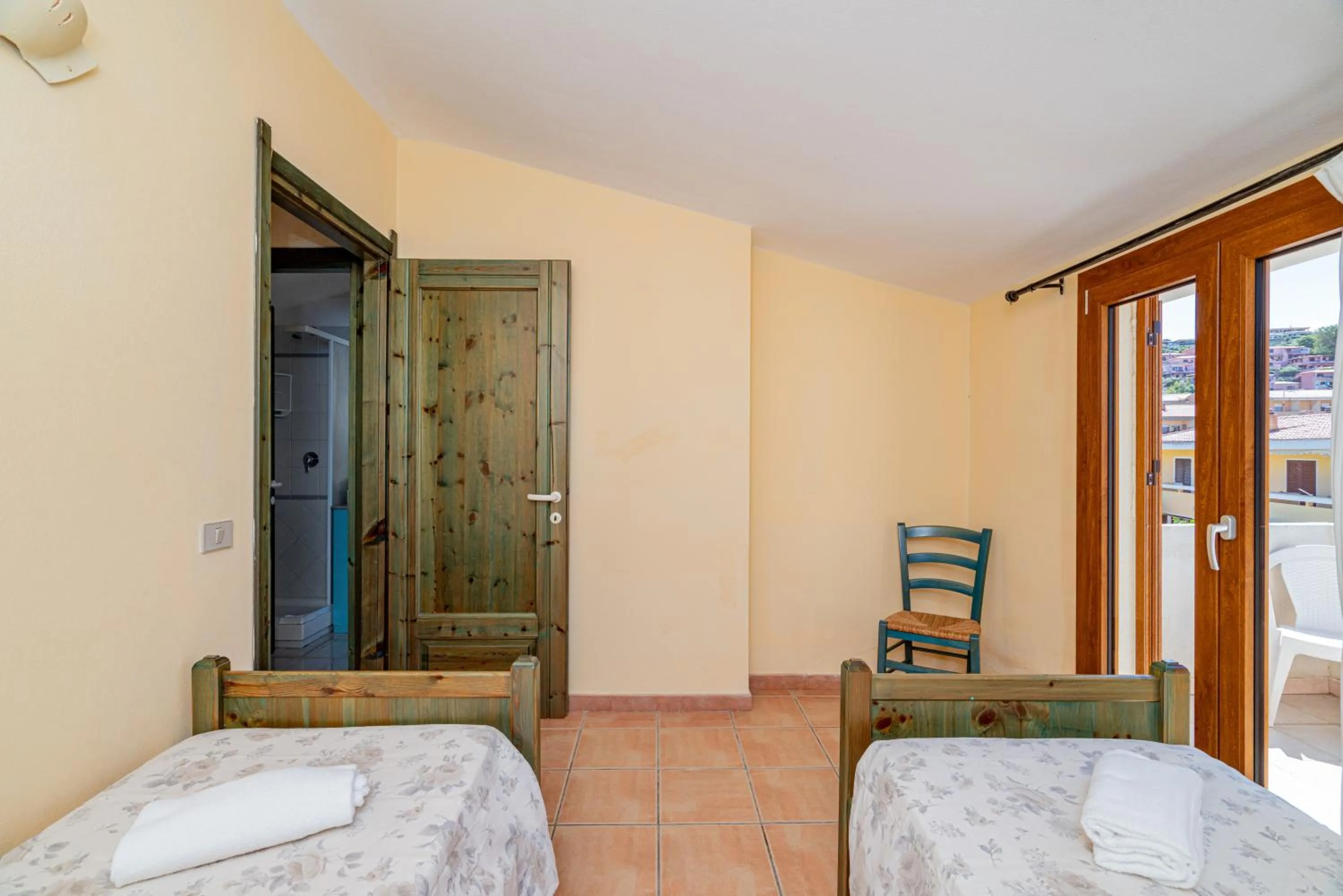 Bed in Club Esse Residence Capo D'orso