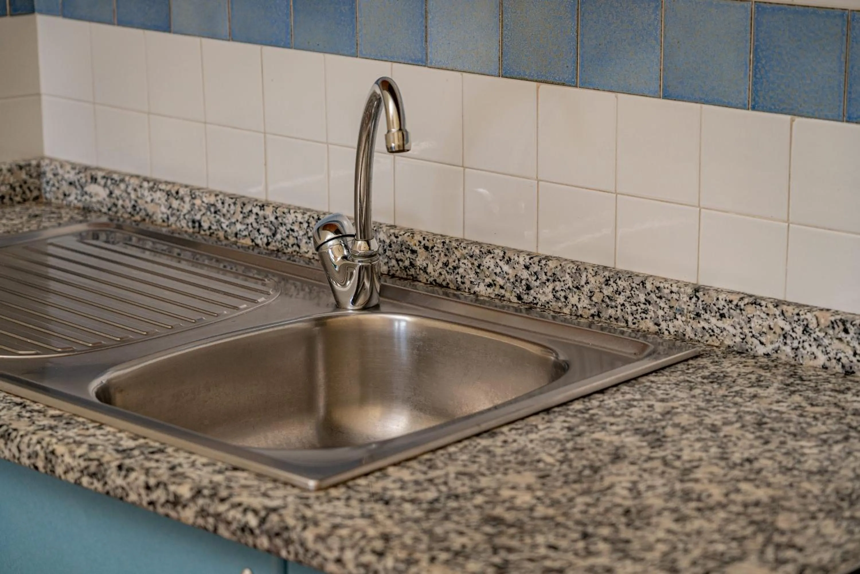 Kitchen or kitchenette in Club Esse Residence Capo D'orso