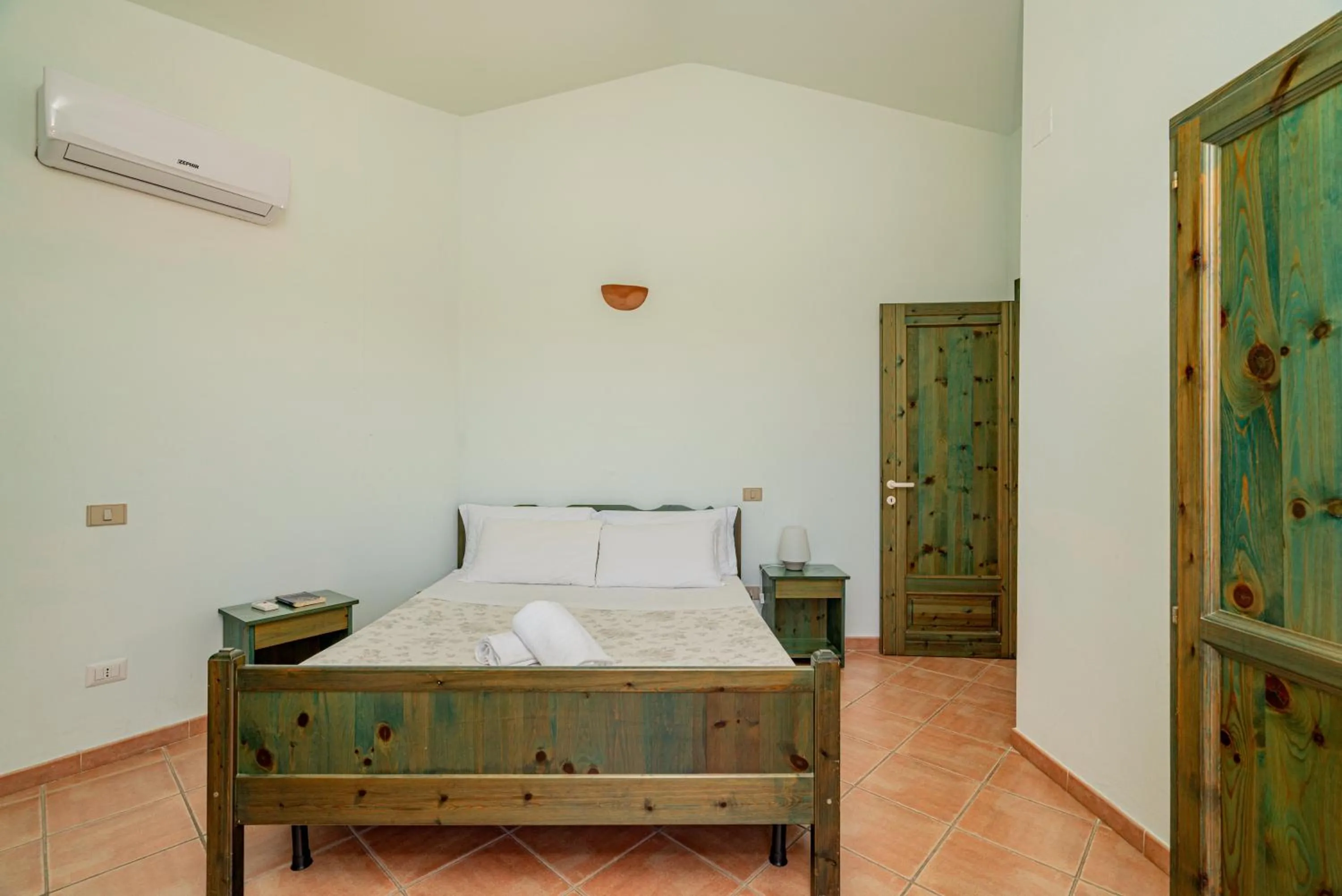 Bed in Club Esse Residence Capo D'orso