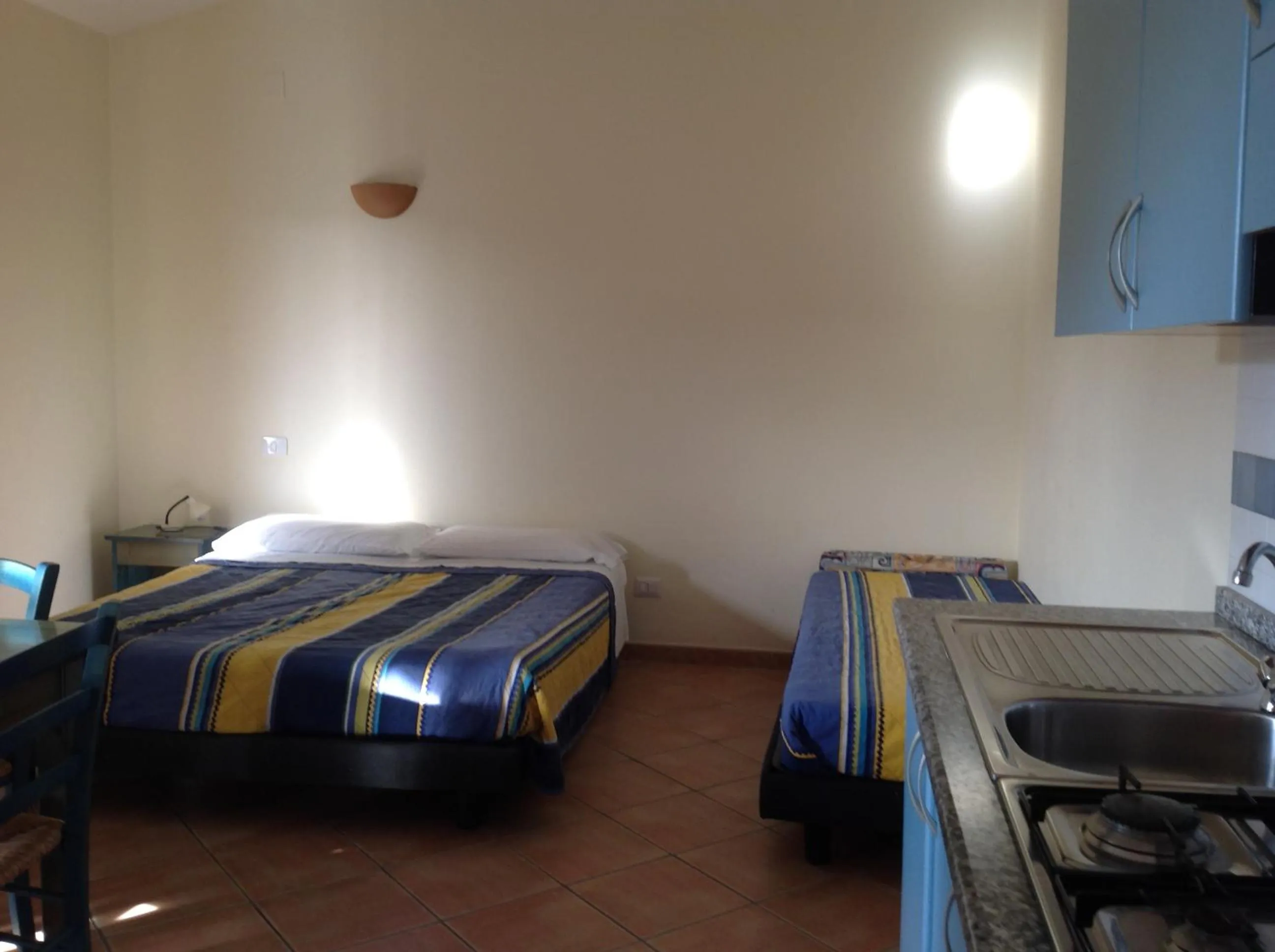 Bed in Club Esse Residence Capo D'orso