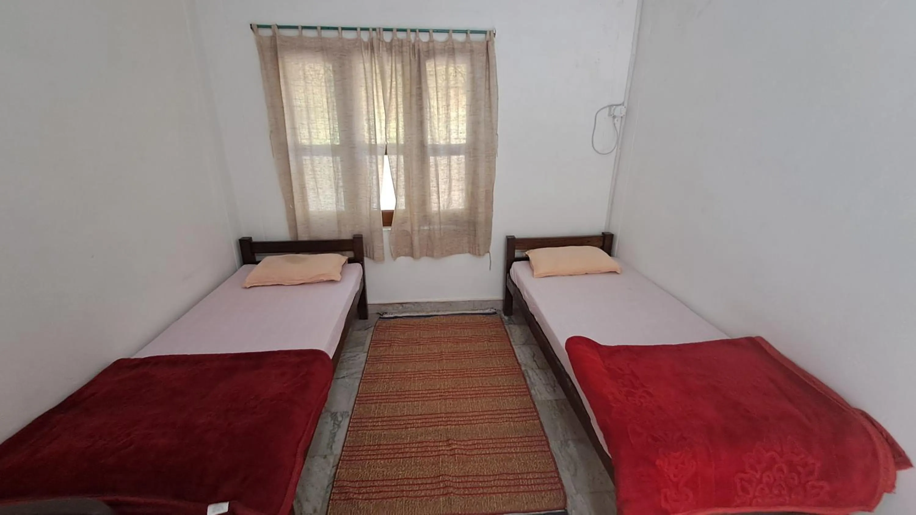Bed in Swami Samarpan Ashram