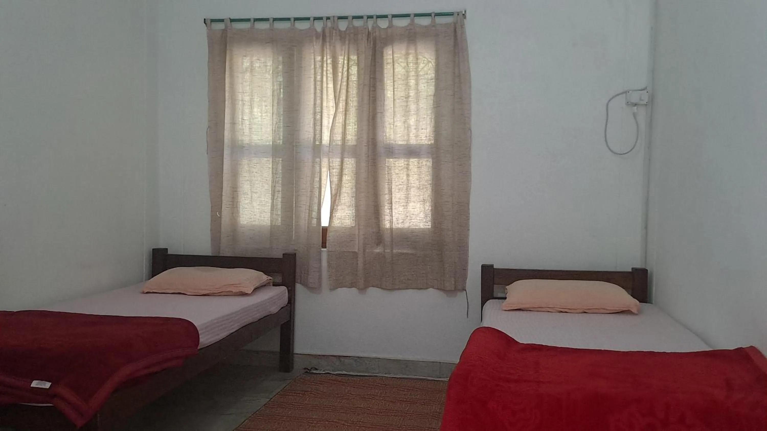 Bed in Swami Samarpan Ashram