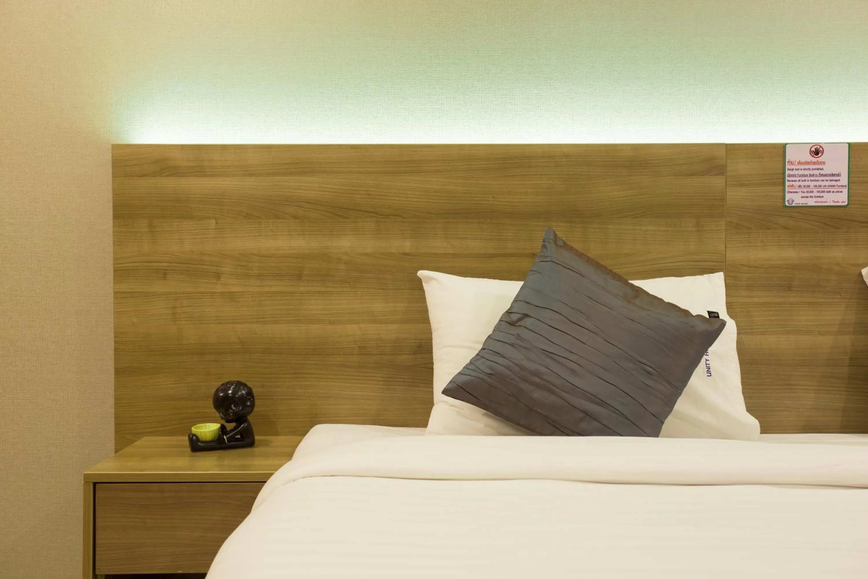 Property building, Bed in Unity Hotel