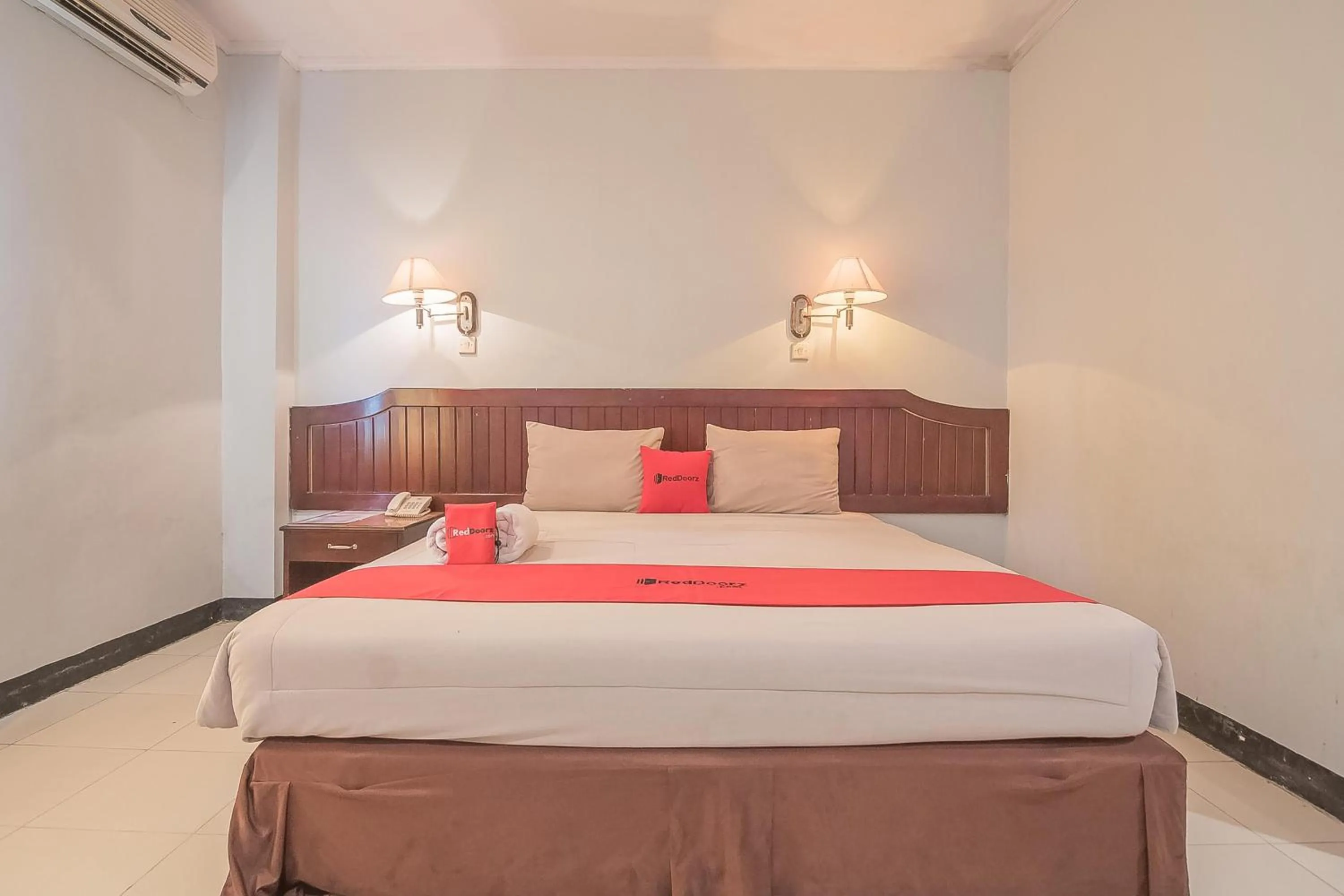 Bed in RedDoorz Syariah at Grand Taufiq Tarakan