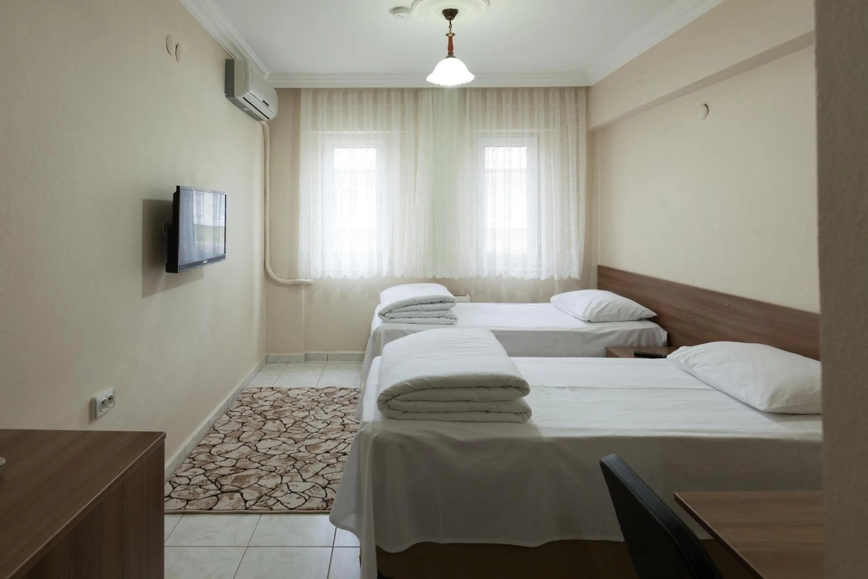 Photo of the whole room, Bed in Gizem Pansiyon