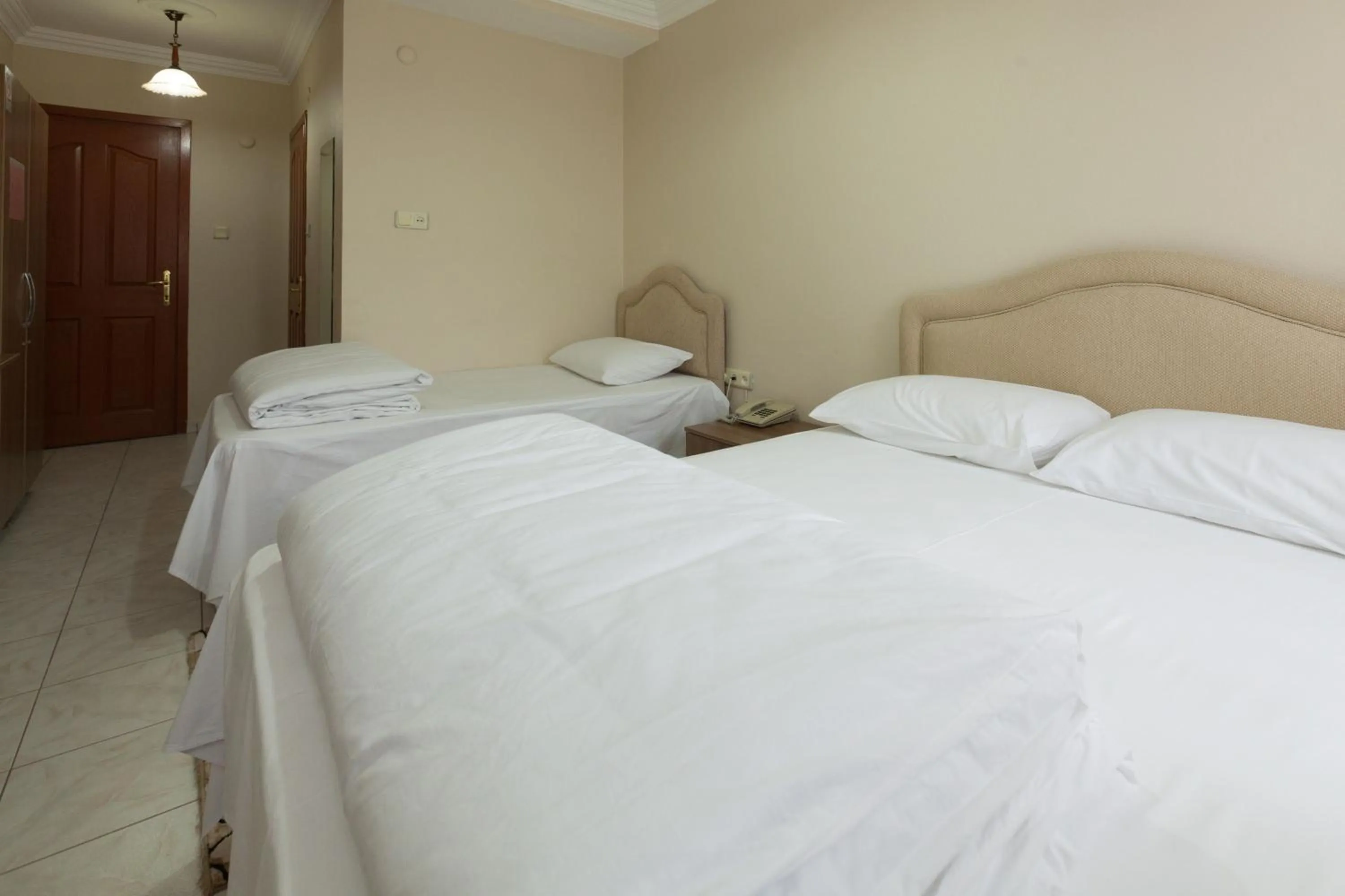 Photo of the whole room, Bed in Gizem Pansiyon