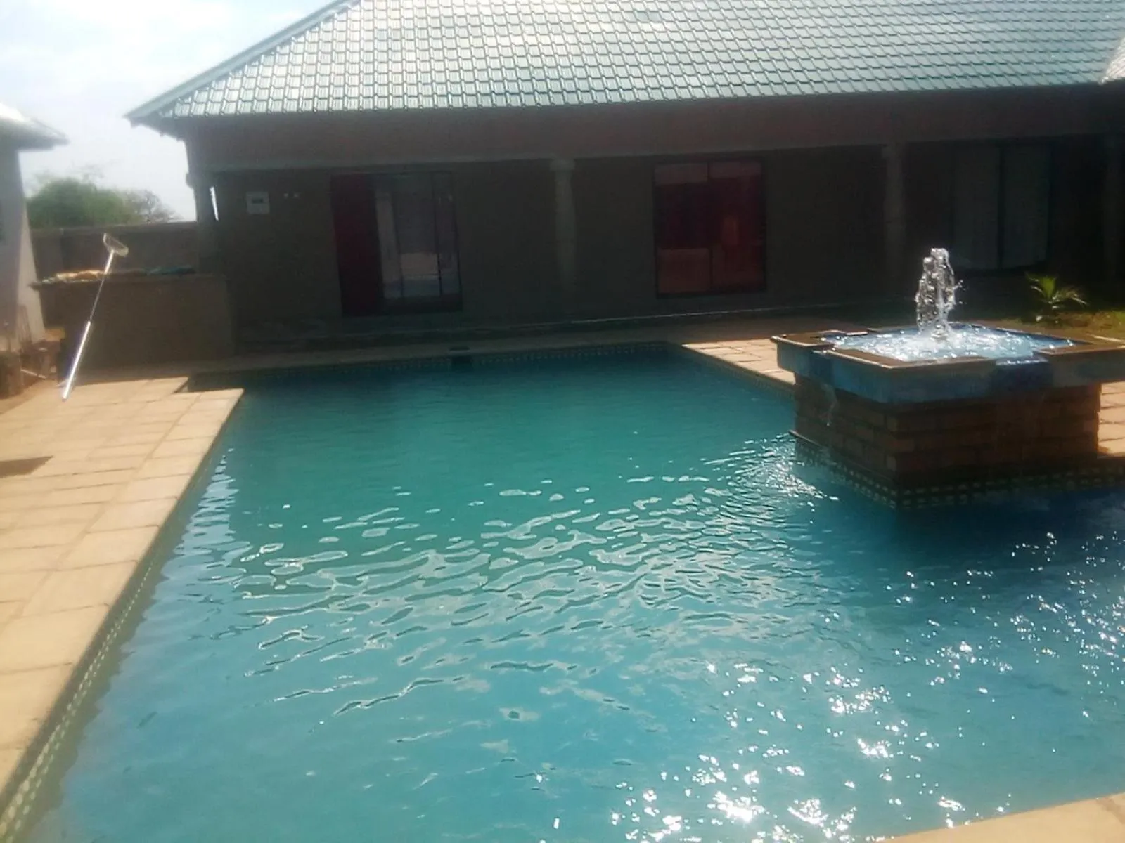 Swimming pool in Royal Olympia Lodges and Safaris Livingstone