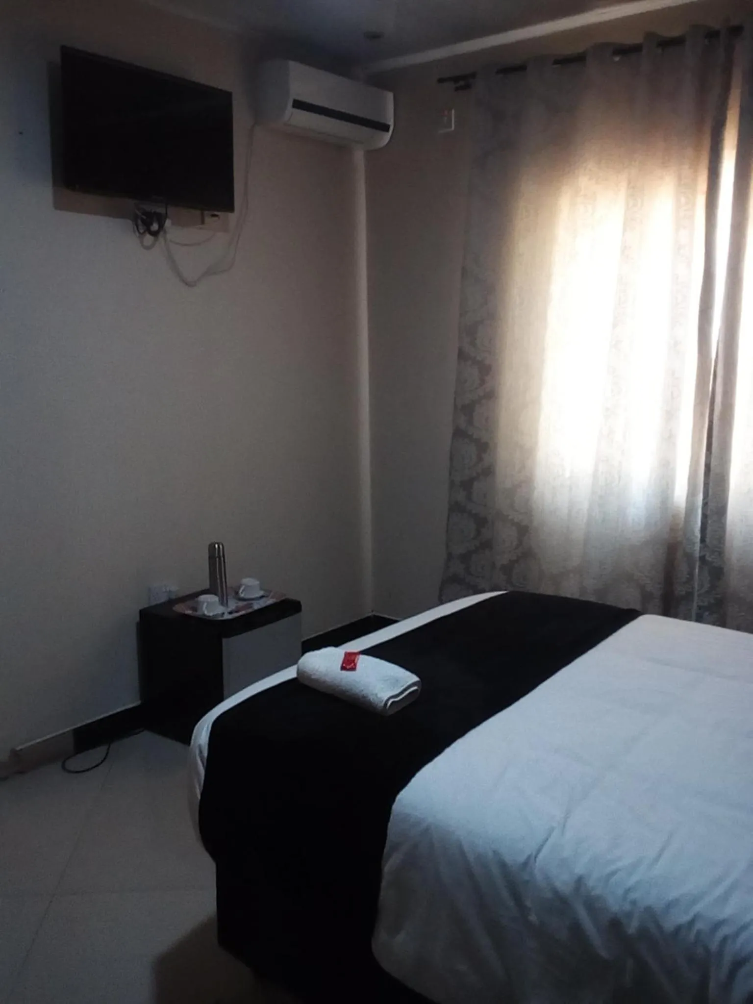 Bed in Royal Olympia Lodges and Safaris Livingstone