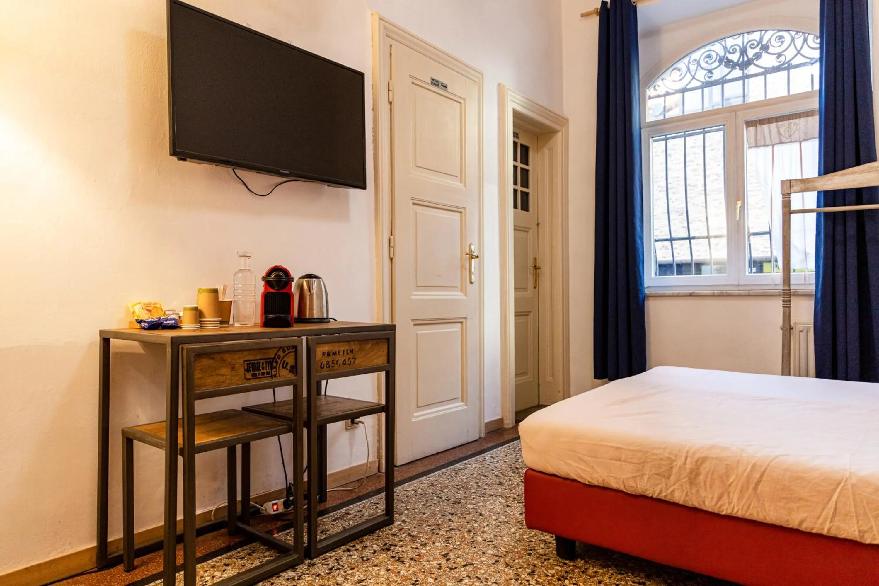 Bed in Bolzano Rooms