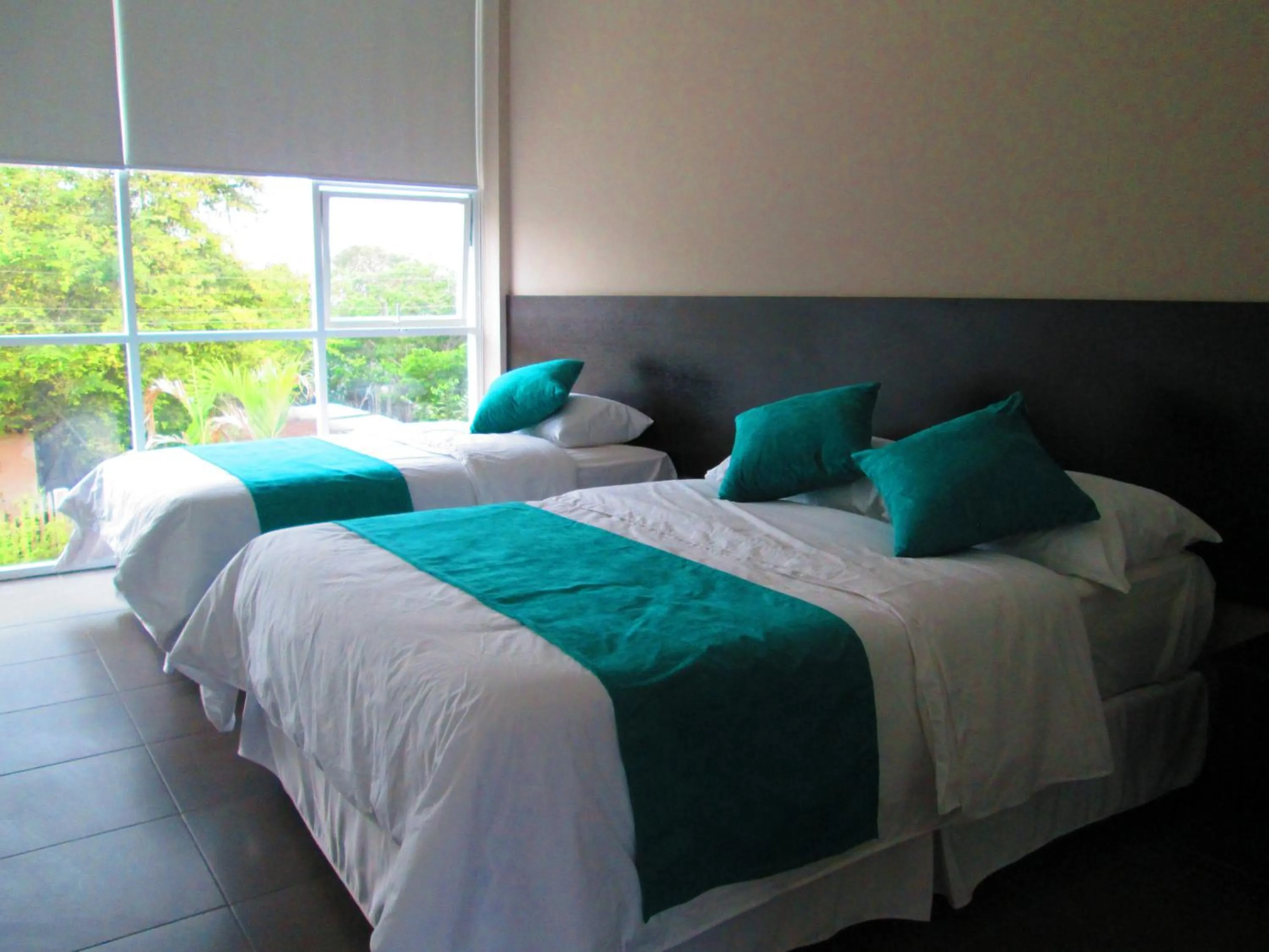 Bed in Ocean Blue Hotel