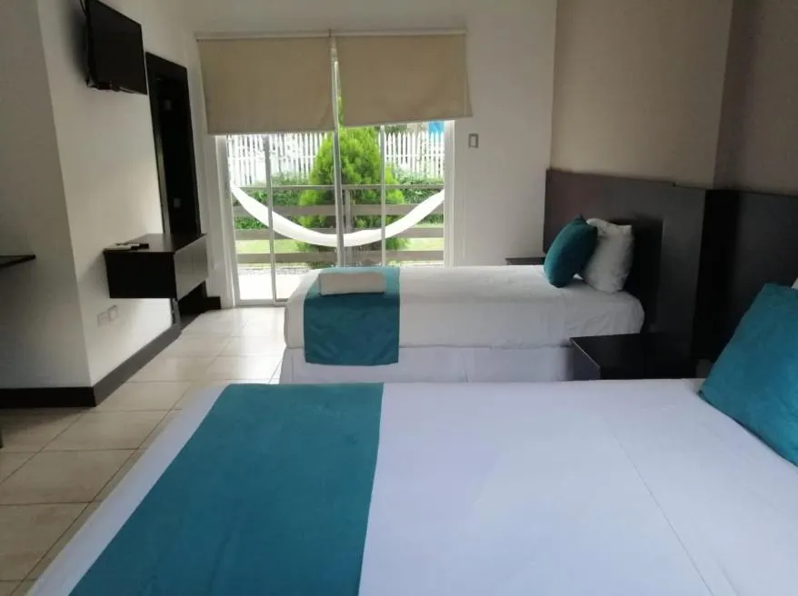 Bed in Ocean Blue Hotel