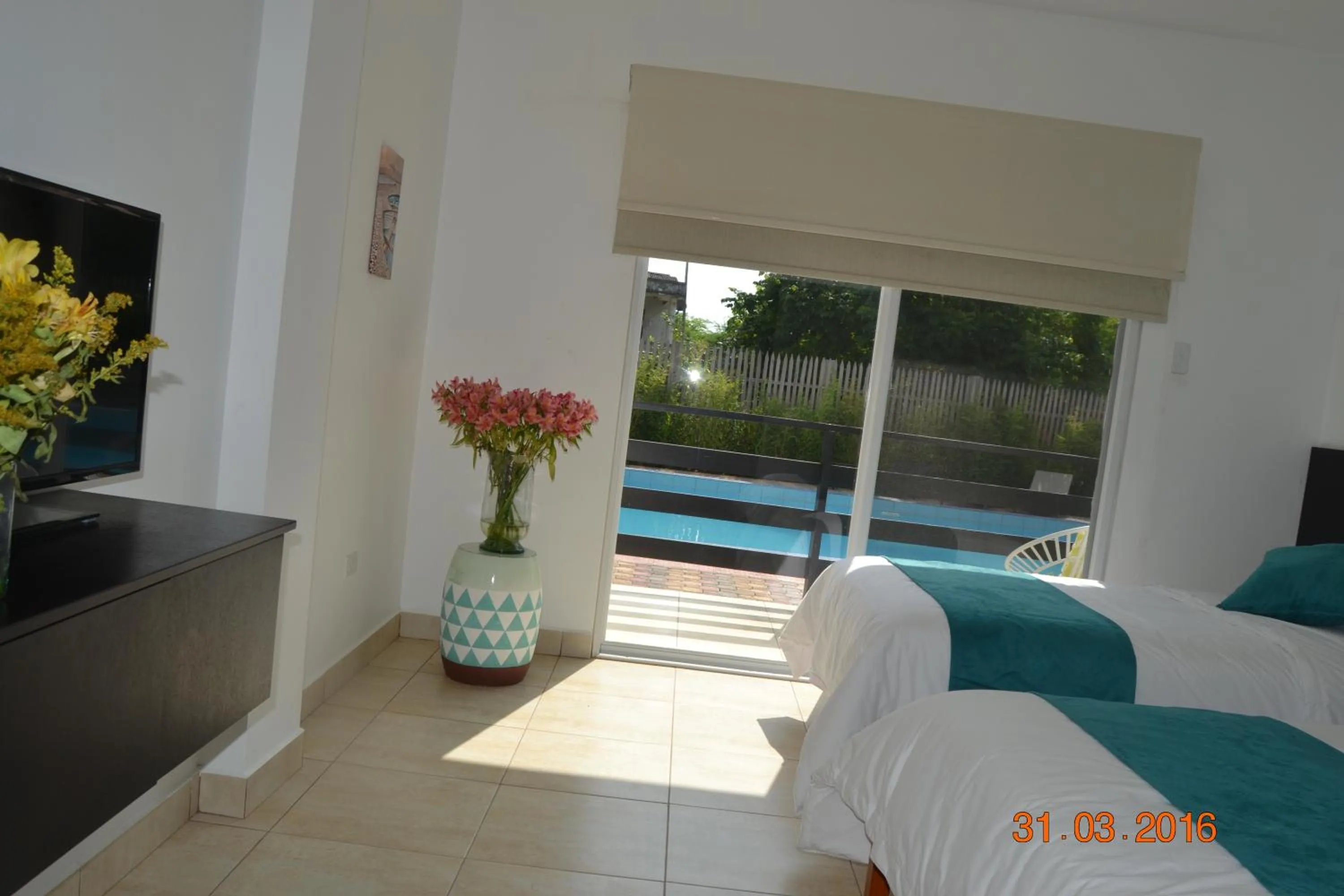 Bed in Ocean Blue Hotel