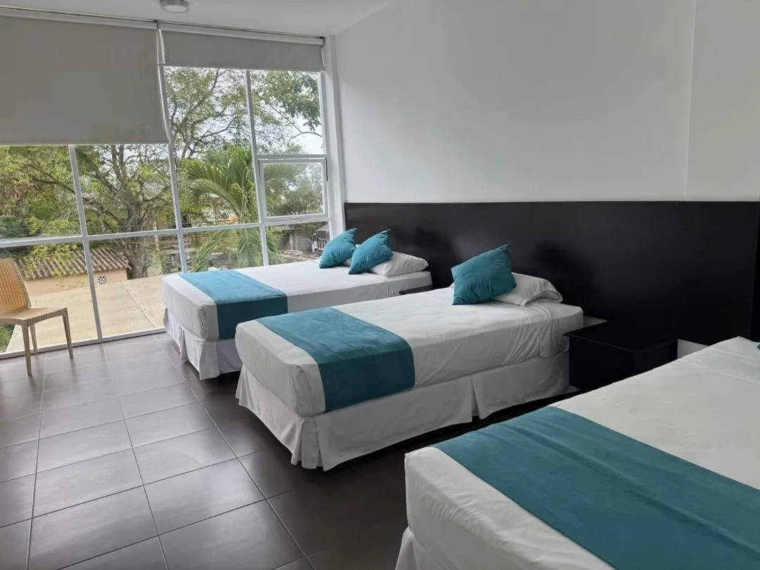 Bed in Ocean Blue Hotel