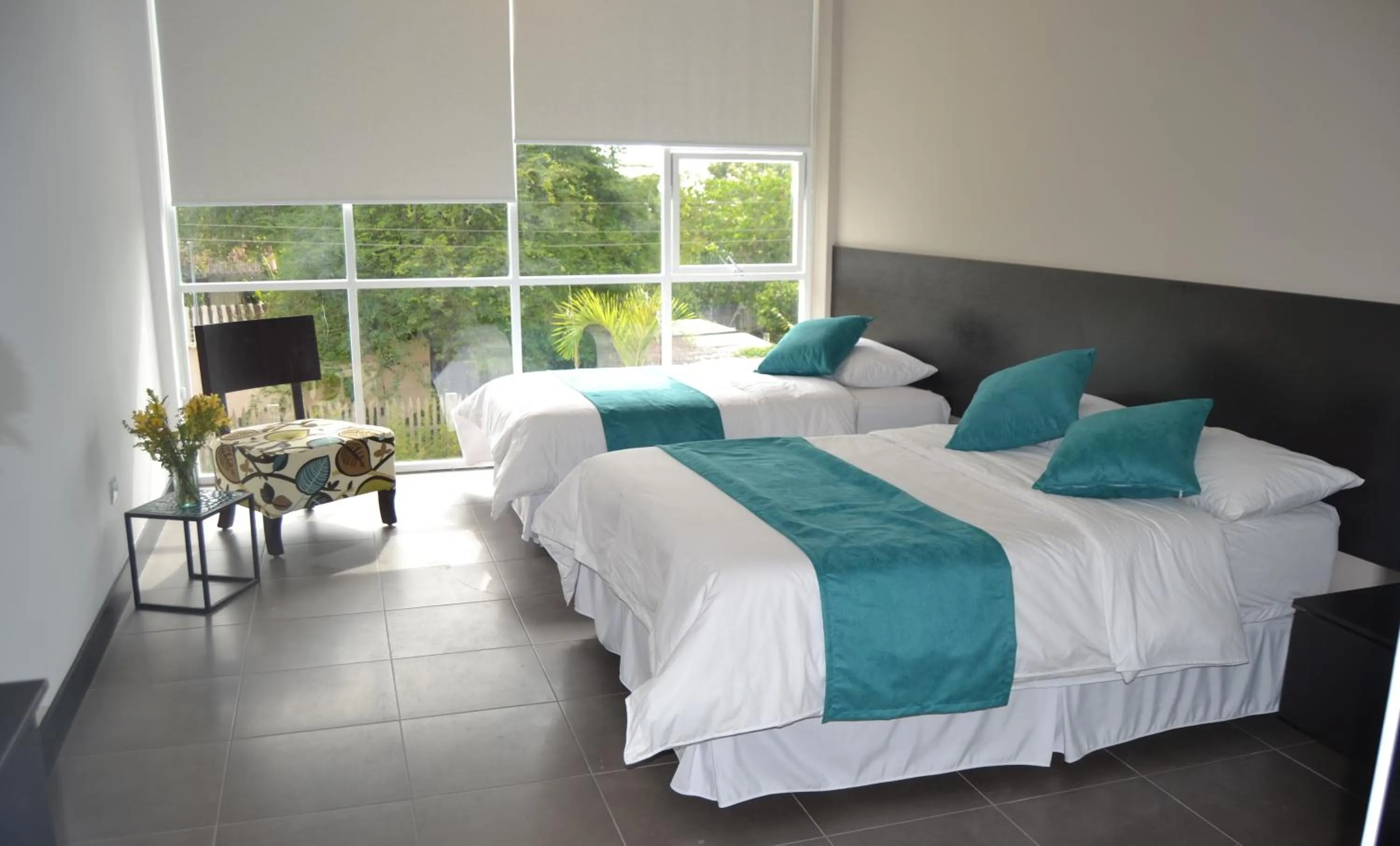 Bed in Ocean Blue Hotel