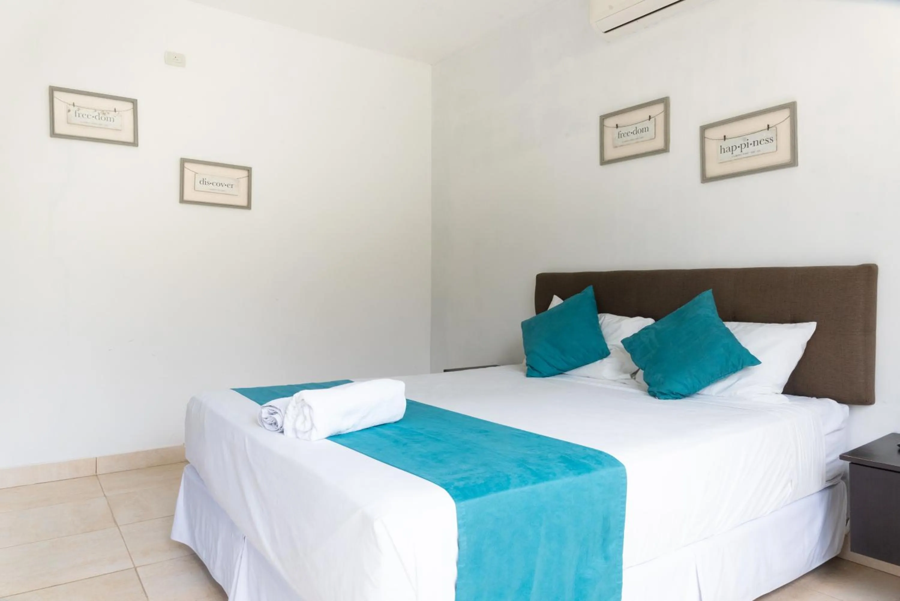 Bed in Ocean Blue Hotel