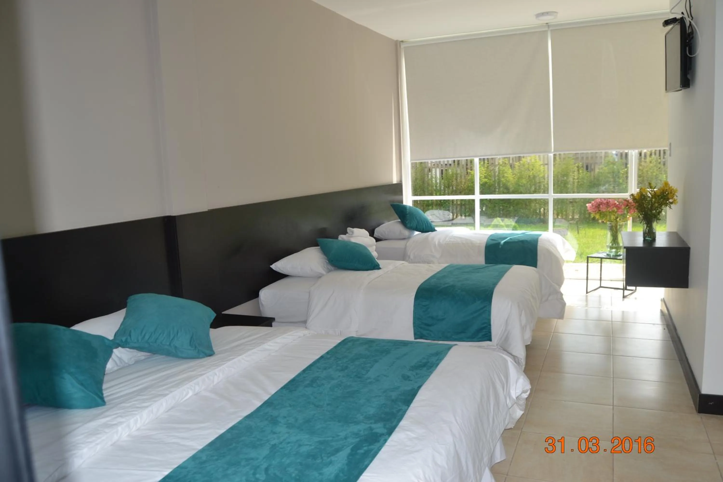 Staff, Bed in Ocean Blue Hotel