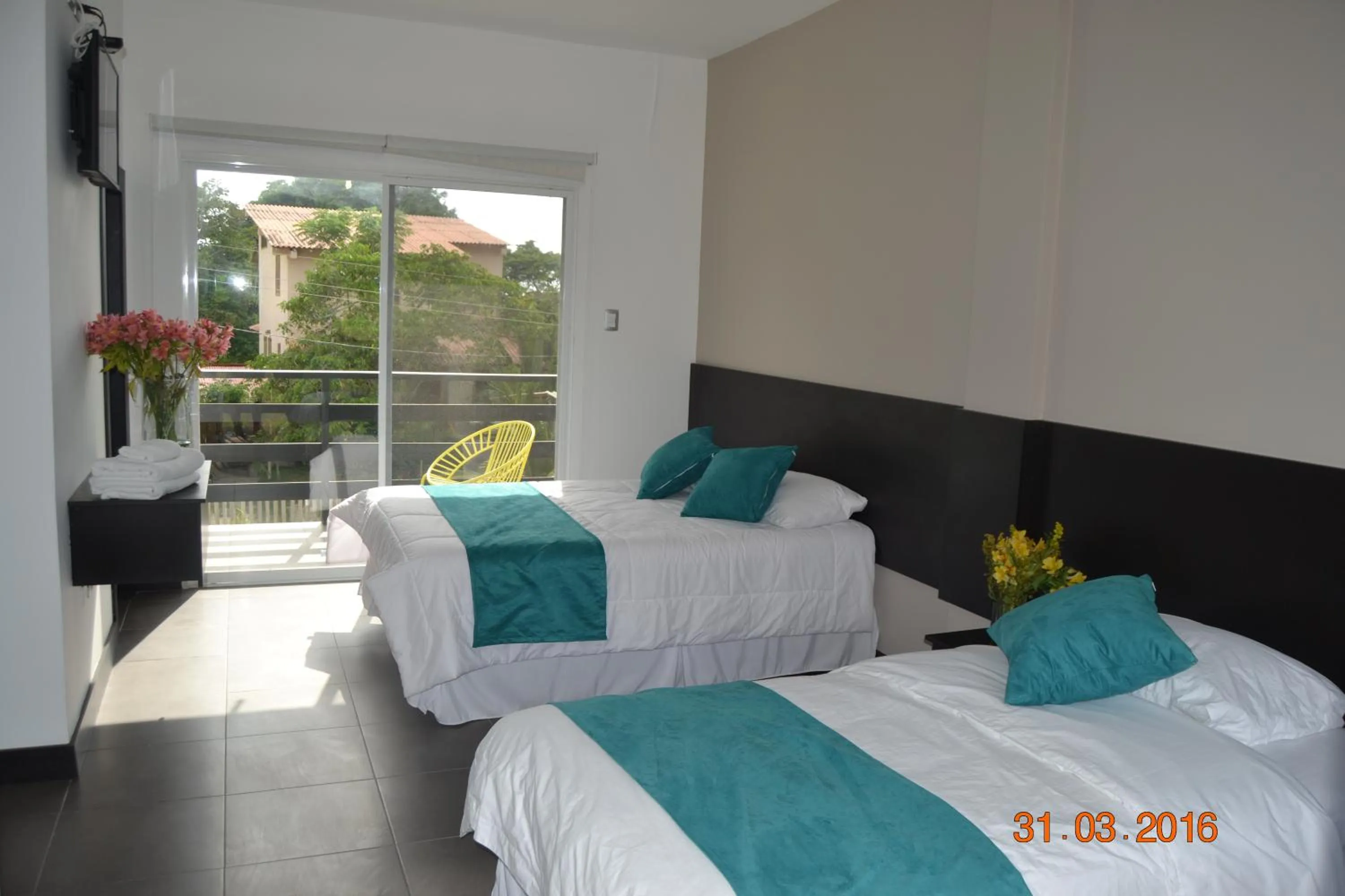 Bed in Ocean Blue Hotel