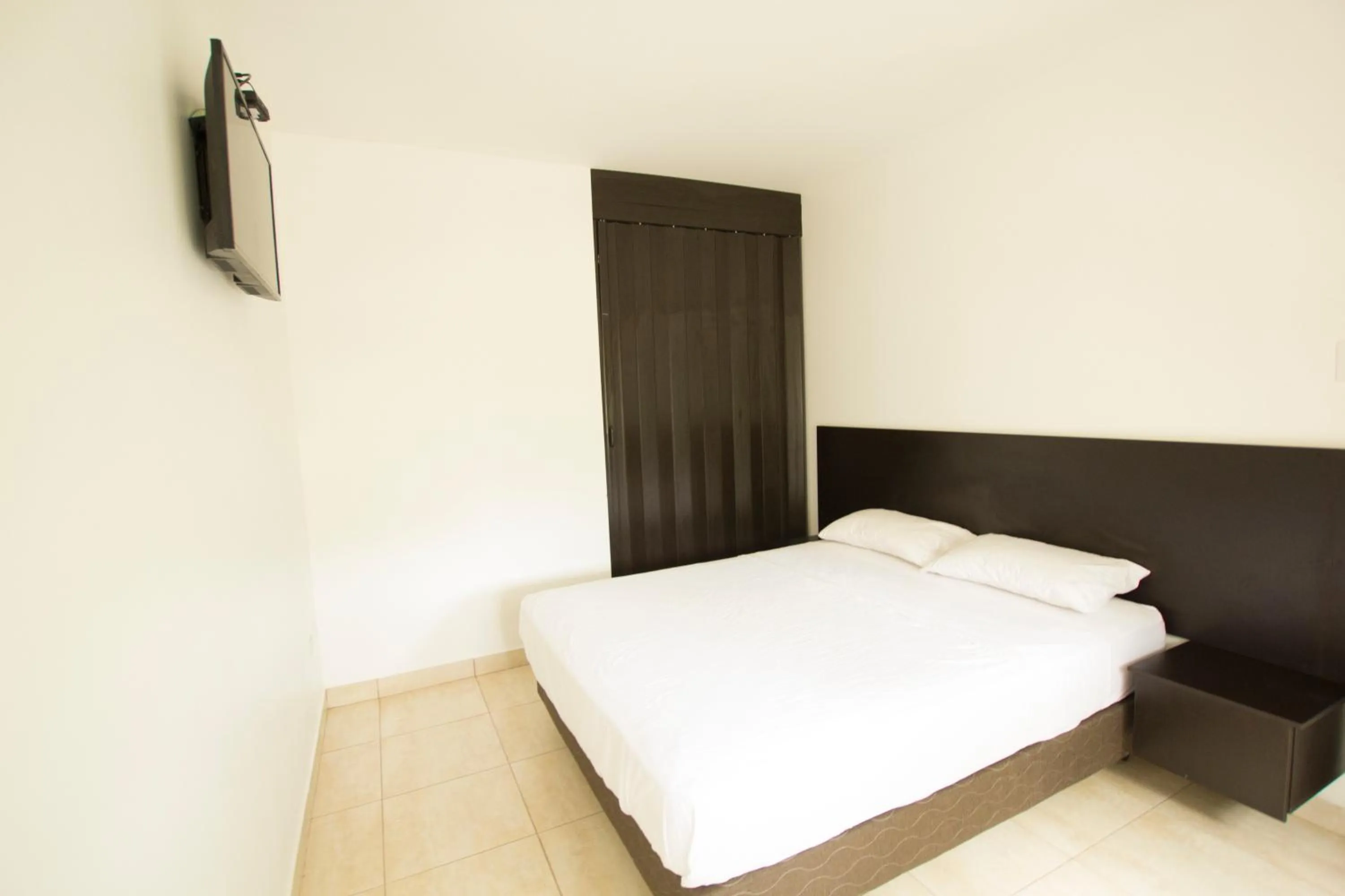 Bed in Ocean Blue Hotel