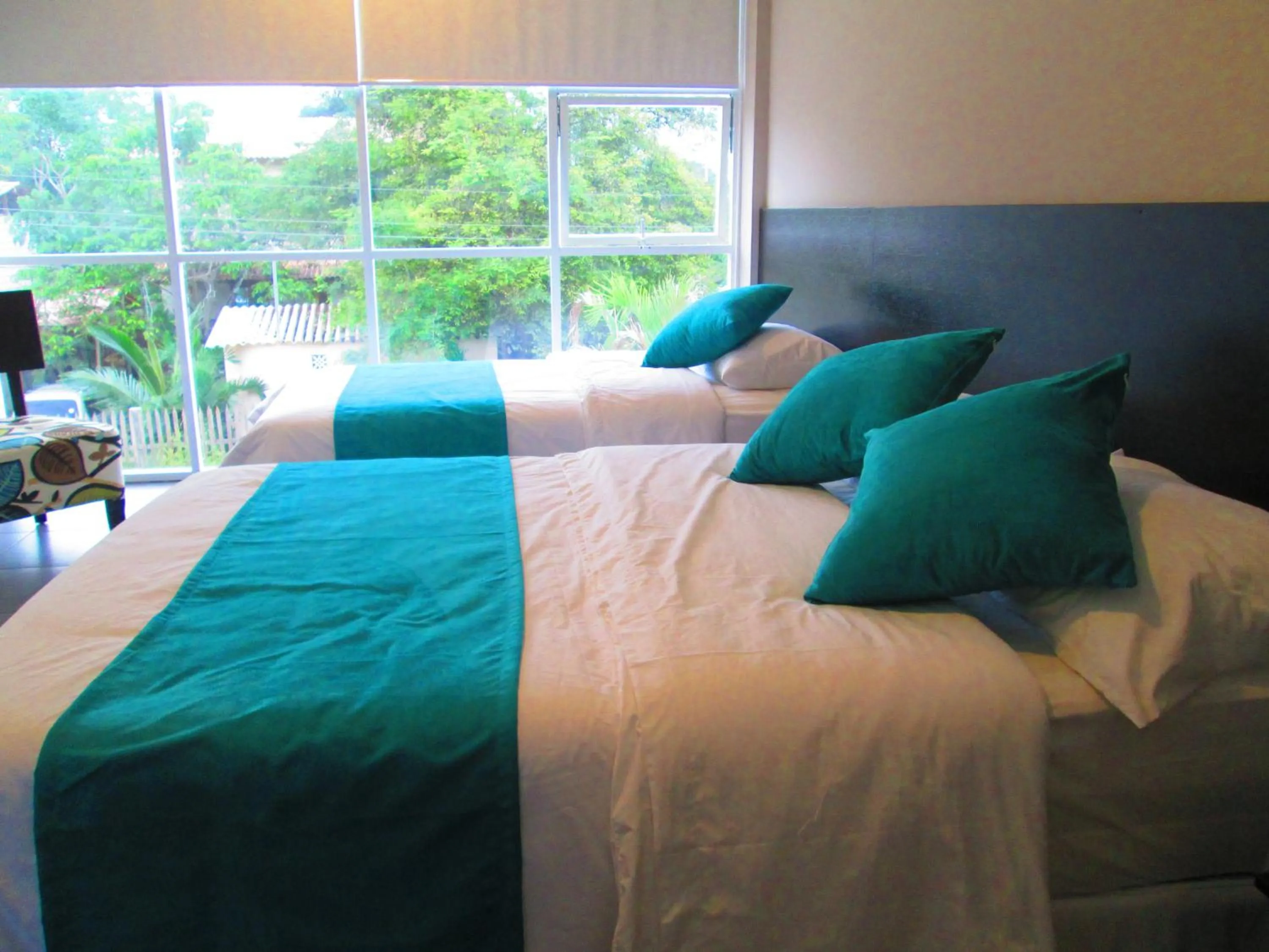 Bed in Ocean Blue Hotel