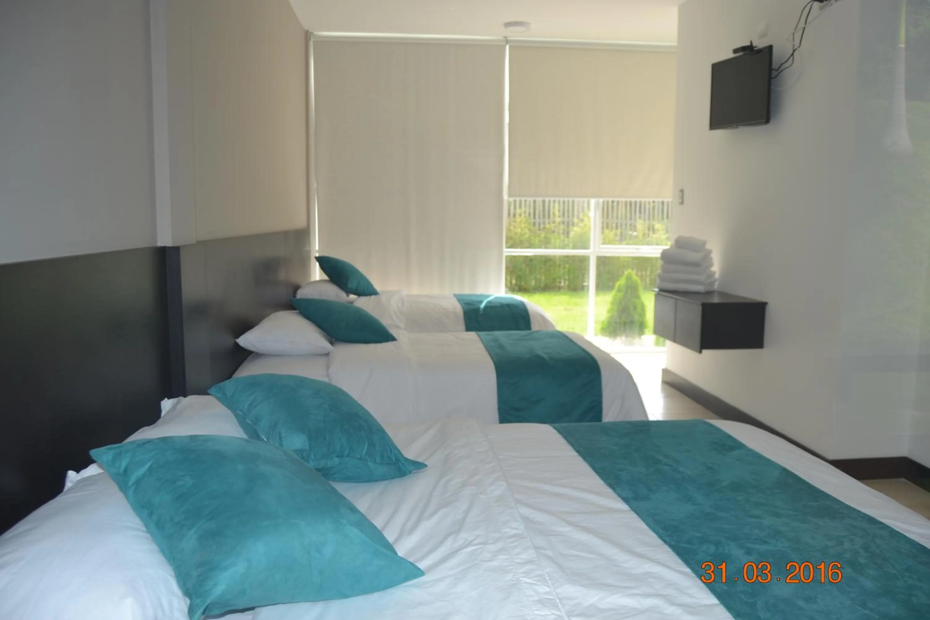 Bed in Ocean Blue Hotel