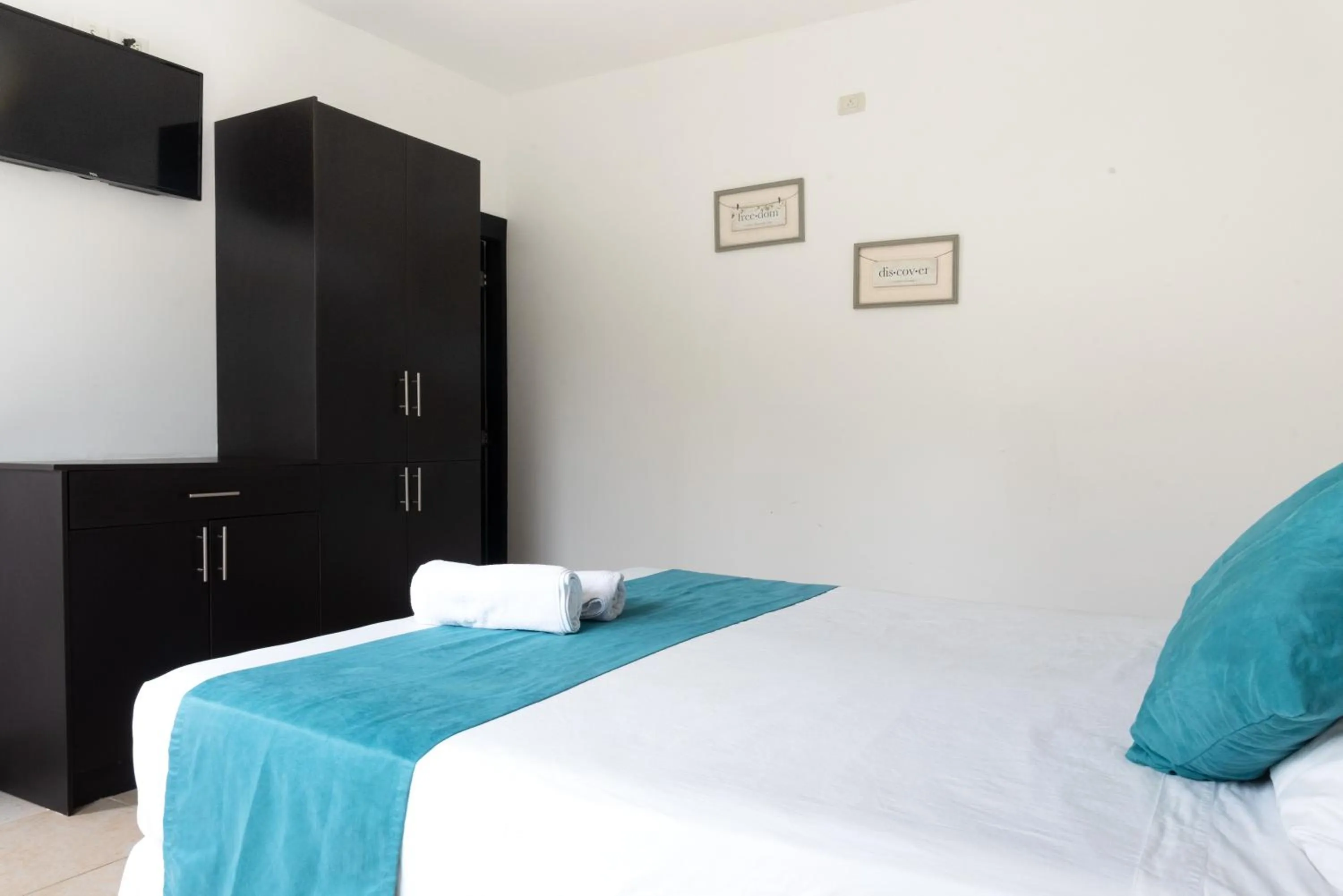 Bed in Ocean Blue Hotel