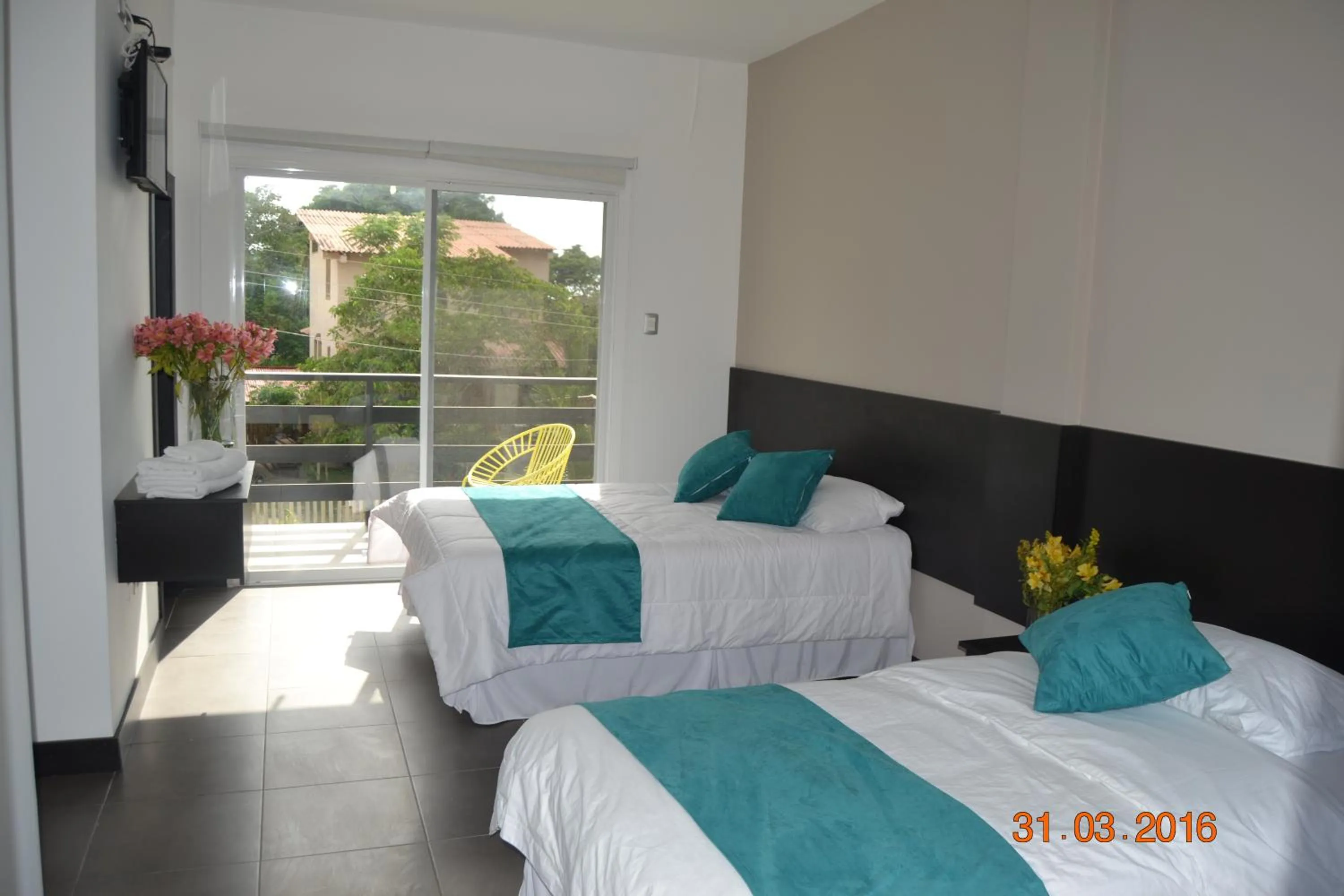 Bed in Ocean Blue Hotel