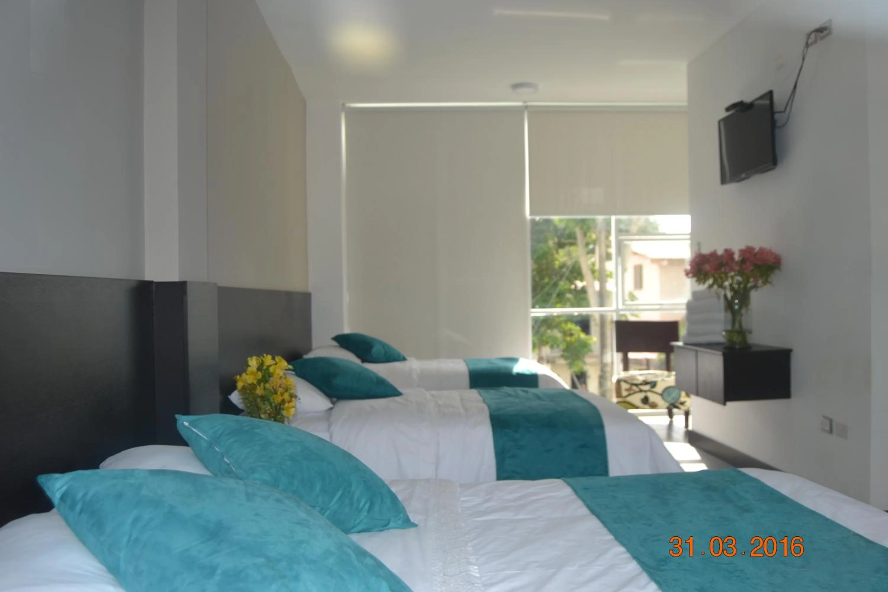 Bed in Ocean Blue Hotel