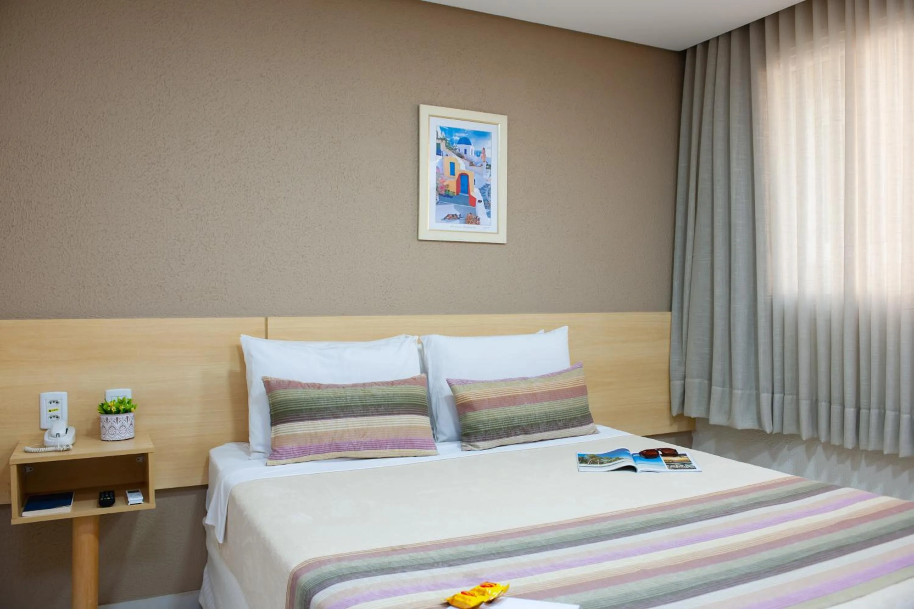 Bed in Hotel Olympia