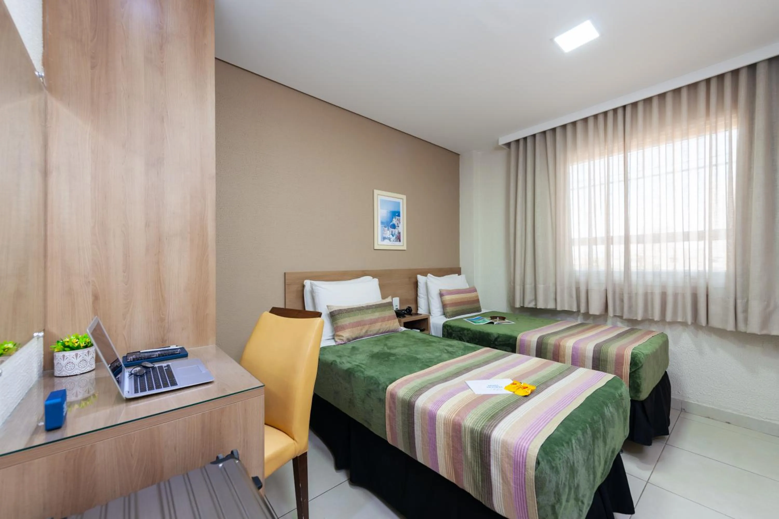 Bed in Hotel Olympia