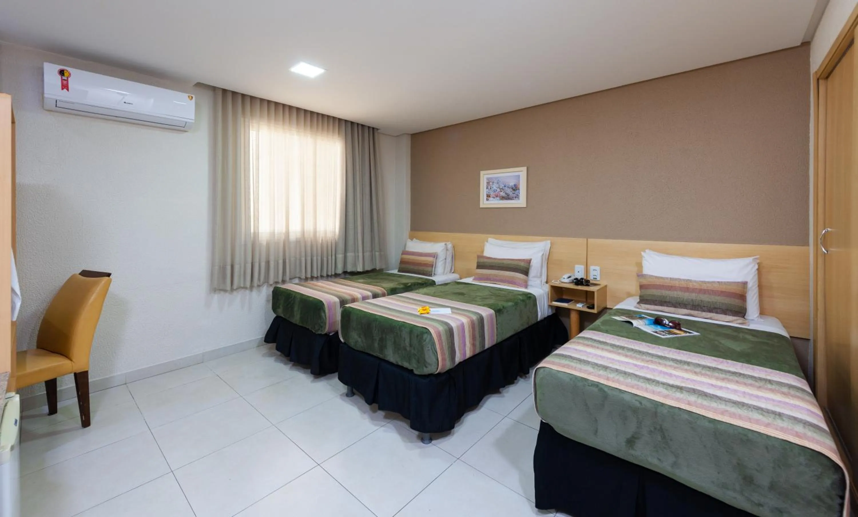 Bed in Hotel Olympia