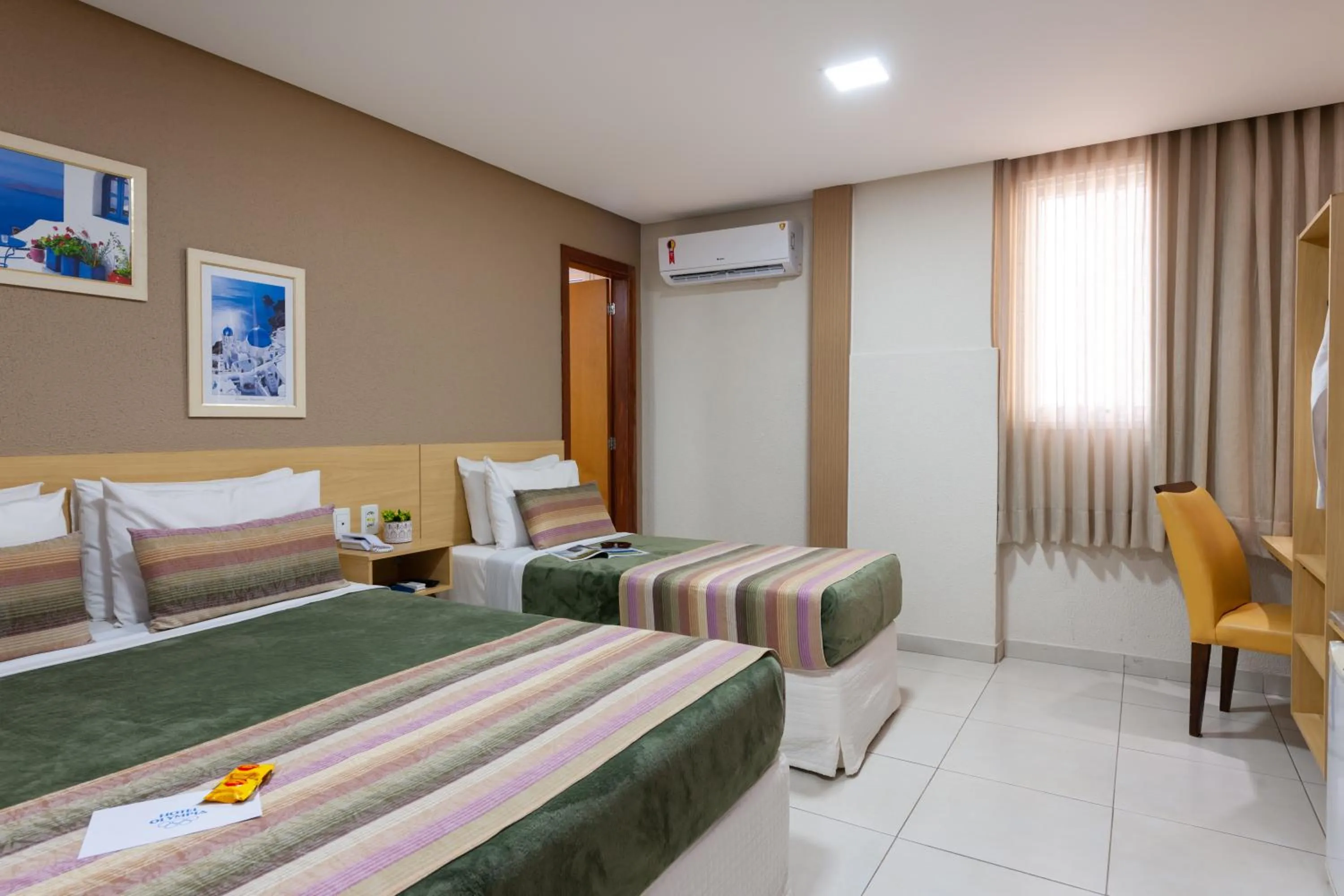 Bed in Hotel Olympia