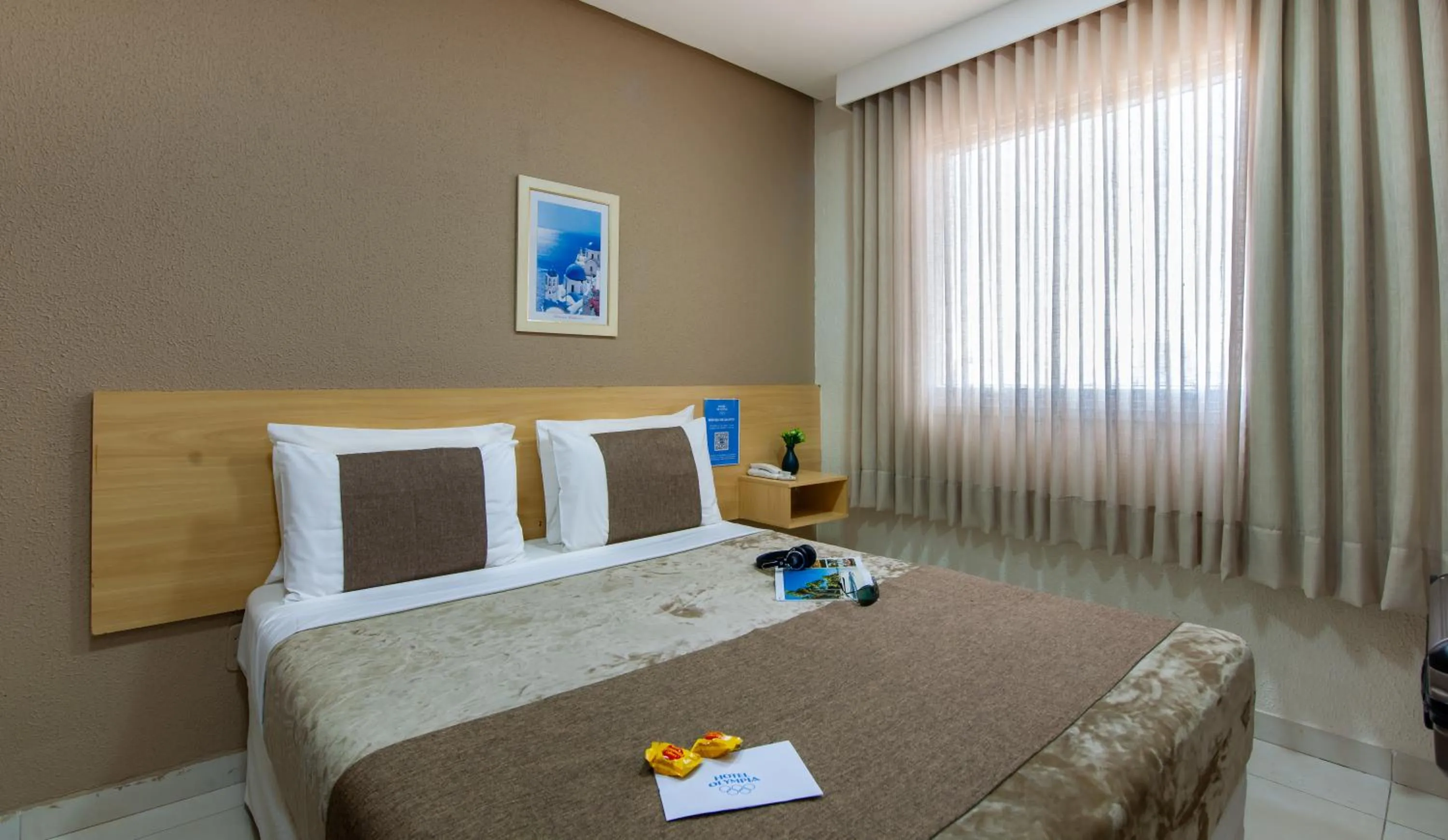 Bed in Hotel Olympia