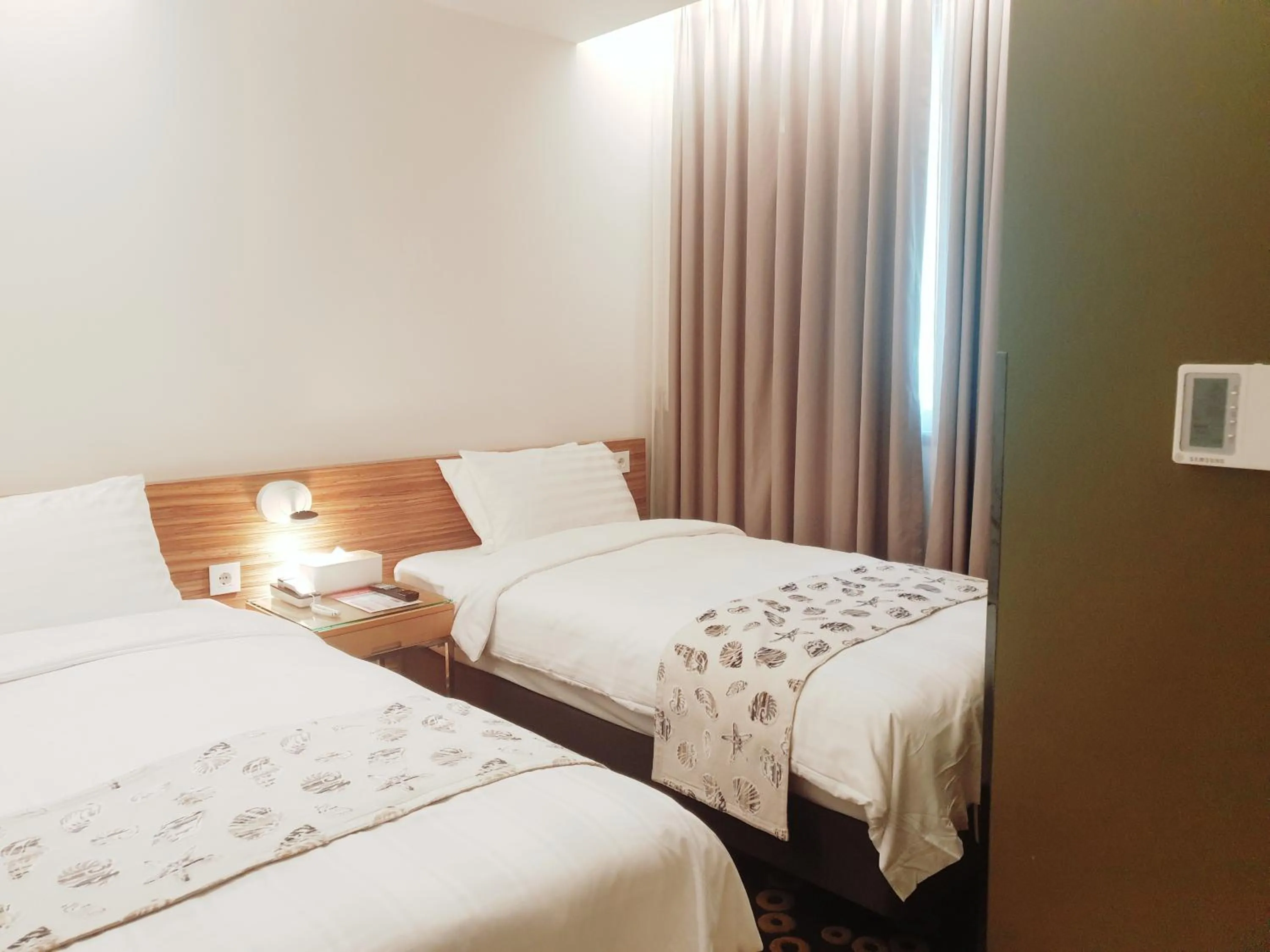 Bed in Hotel Matthieu Yeosu