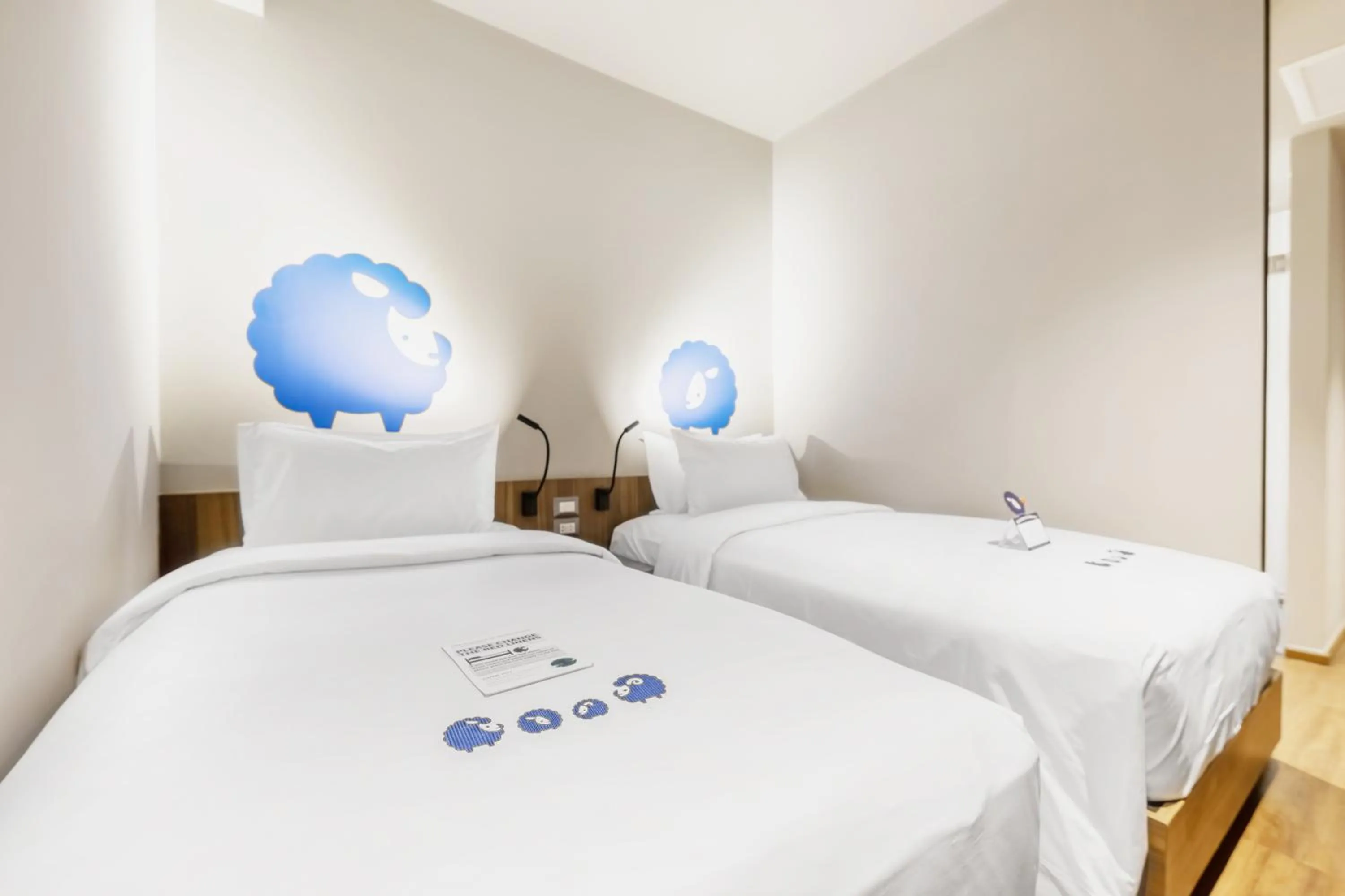 Bed in Kokotel Bangkok Surawong